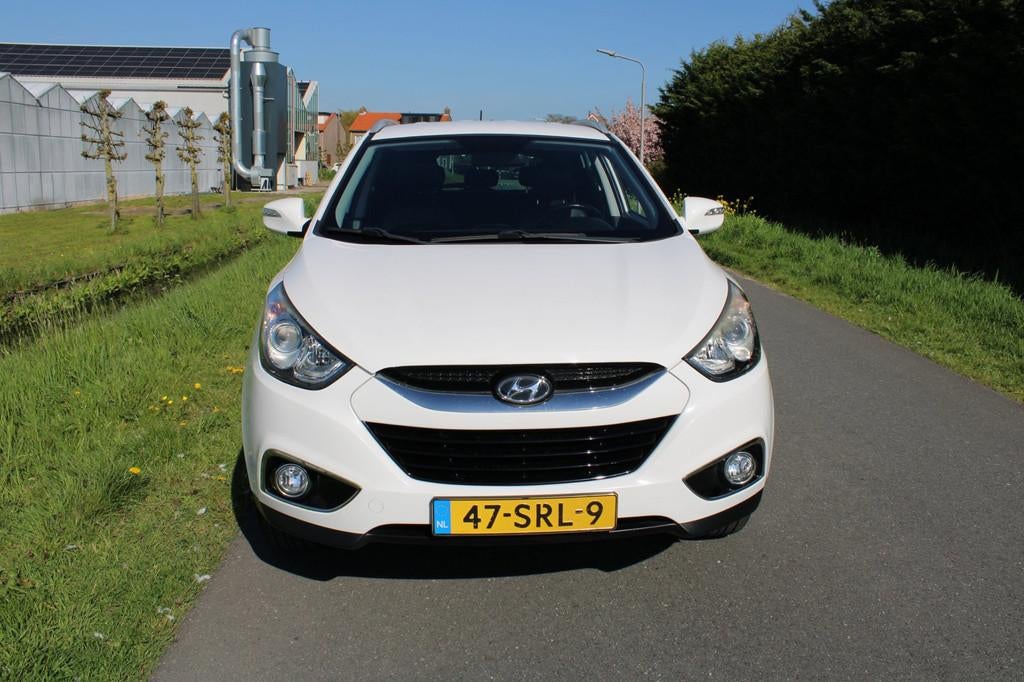 Hyundai Ix35 2.0i Business Edition Automaat, Auto's, Gebruikt, Leder en Stof, Origineel Nederlands, 1600 kg