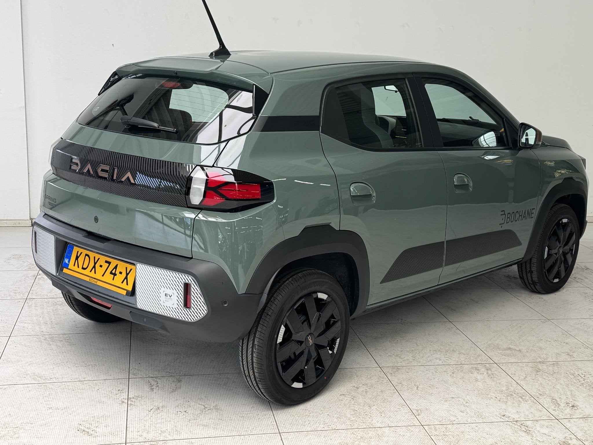 Dacia Spring Extreme 100 27,5 KwH | DEMO | Navigatie | Airco, Auto's, 970 kg, Stof, Huisgarantie, Met garantie (alle)