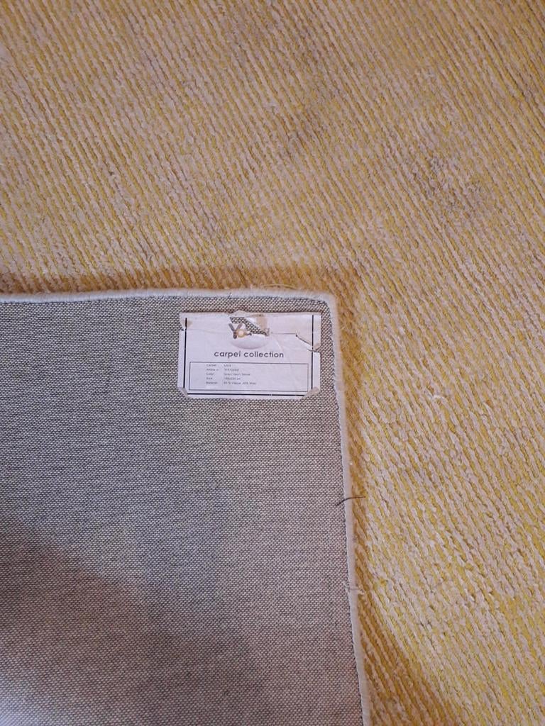 Geel/grijsbeige vloerkleed van wol en viscose, Huis en Inrichting, Ophalen, Gebruikt, Overige kleuren, 150 tot 200 cm