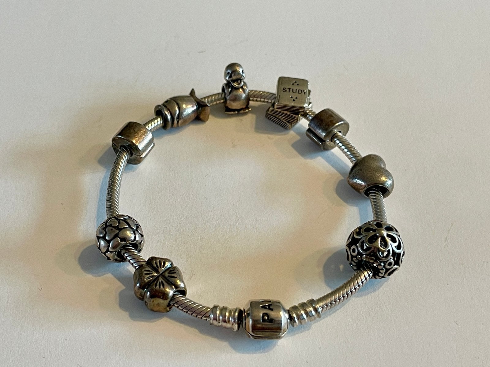 Pandora armband 20 cm met bedels en stoppers, Ophalen of Verzenden, Zo goed als nieuw, Zilver, Met bedels of kralen
