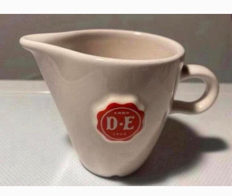 Melkkannetje van DE / Douwe Egberts. Hoogte 7,5 cm., Overige typen, Ophalen of Verzenden, Zo goed als nieuw, Overige stijlen