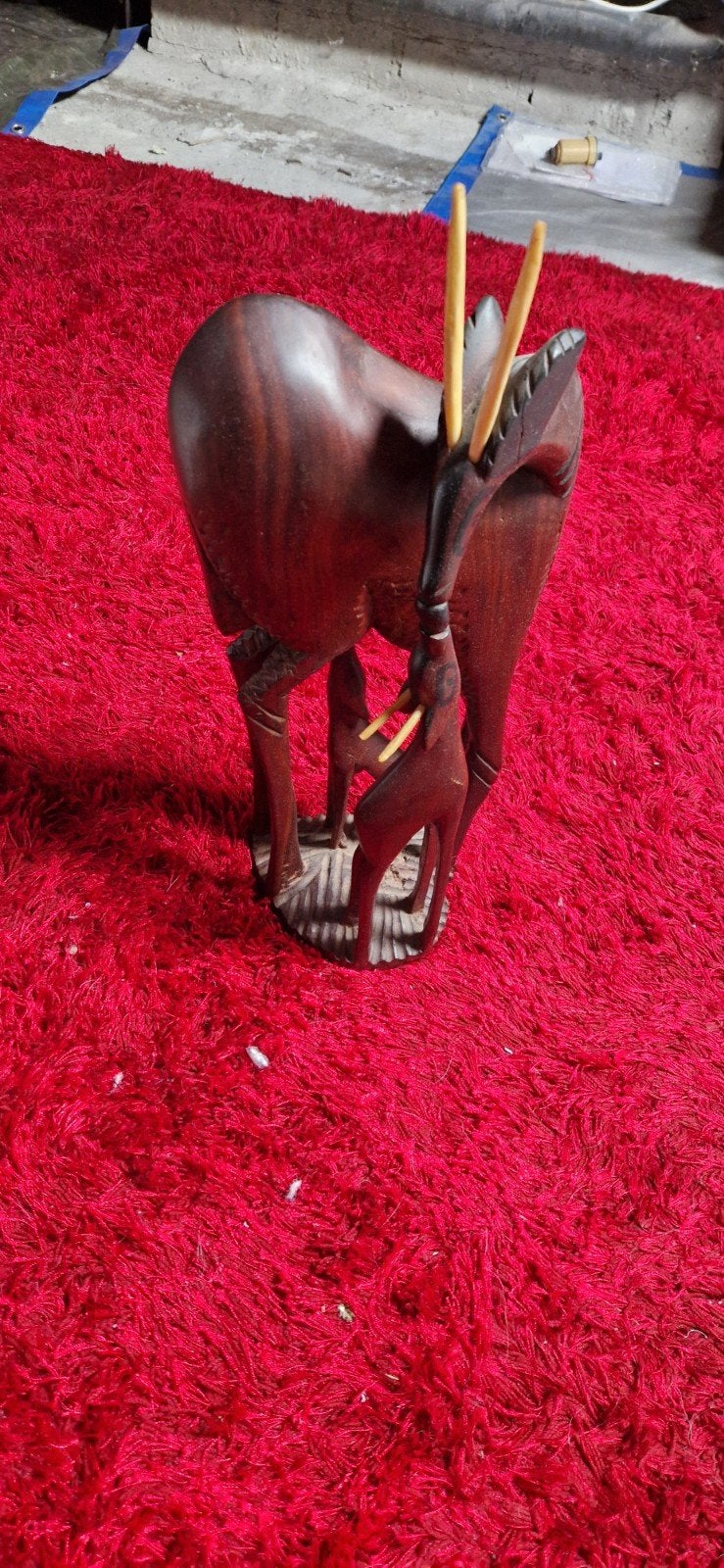 Houten beeld, Ophalen