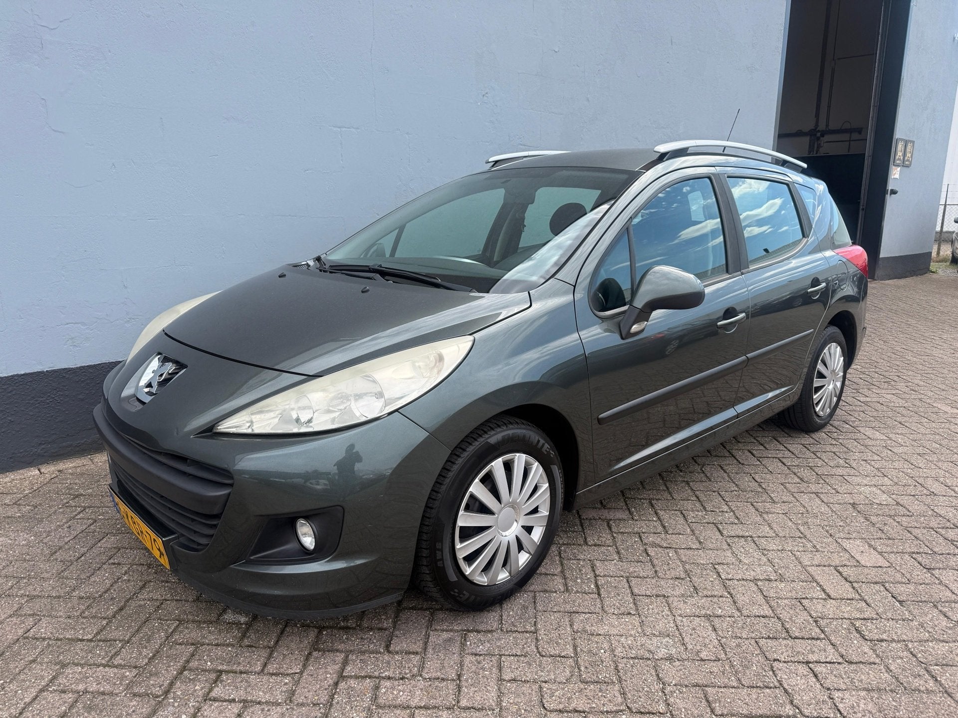 Peugeot 207 SW 1.4 VTi Sportium - Airco, Auto's, Voorwielaandrijving, Euro 5, Gebruikt, Handgeschakeld