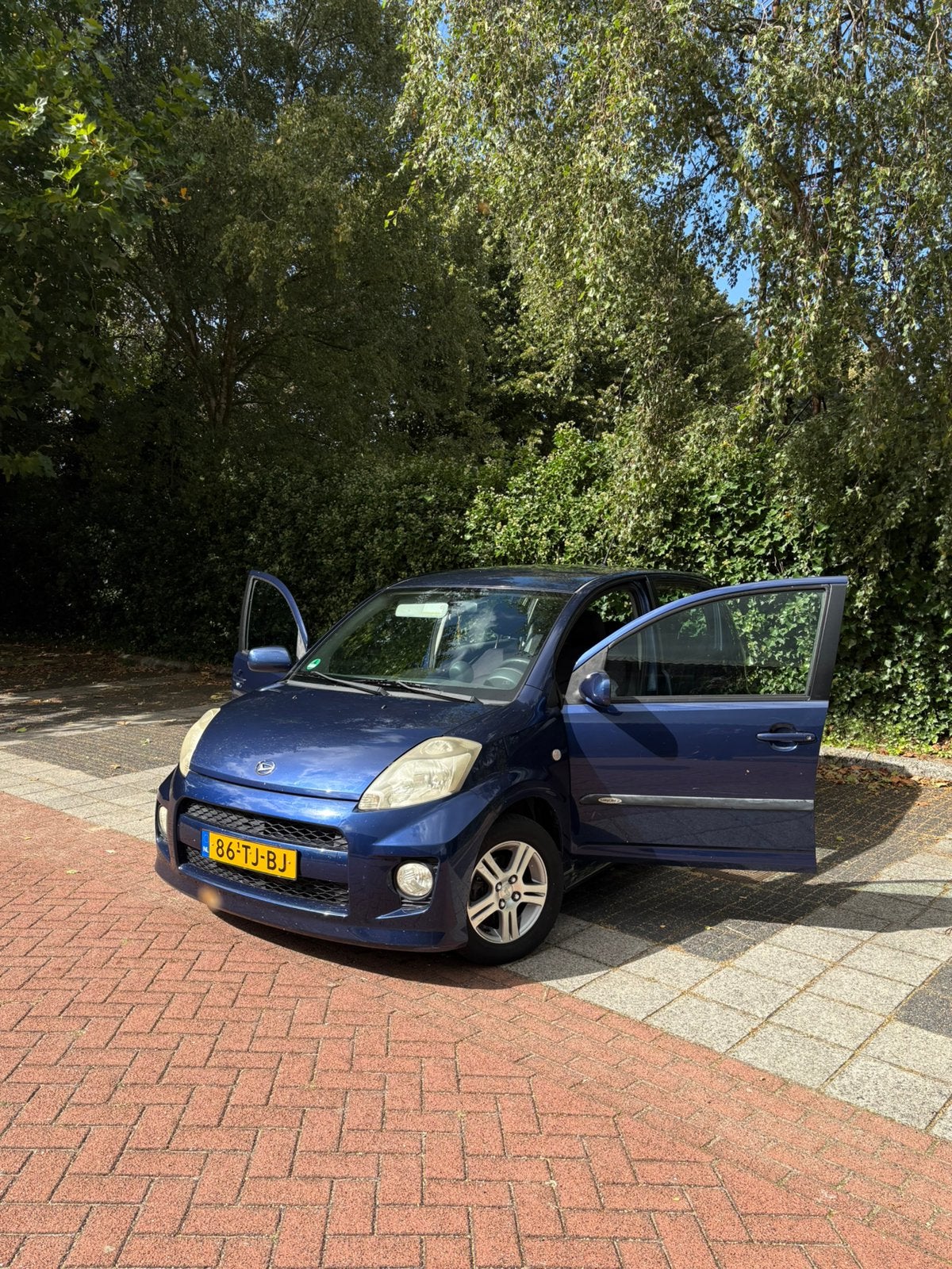 Daihatsu Sirion 1.3 2006 Blauw, Auto's, Voorwielaandrijving, 31 €/maand, 4 cilinders, Blauw