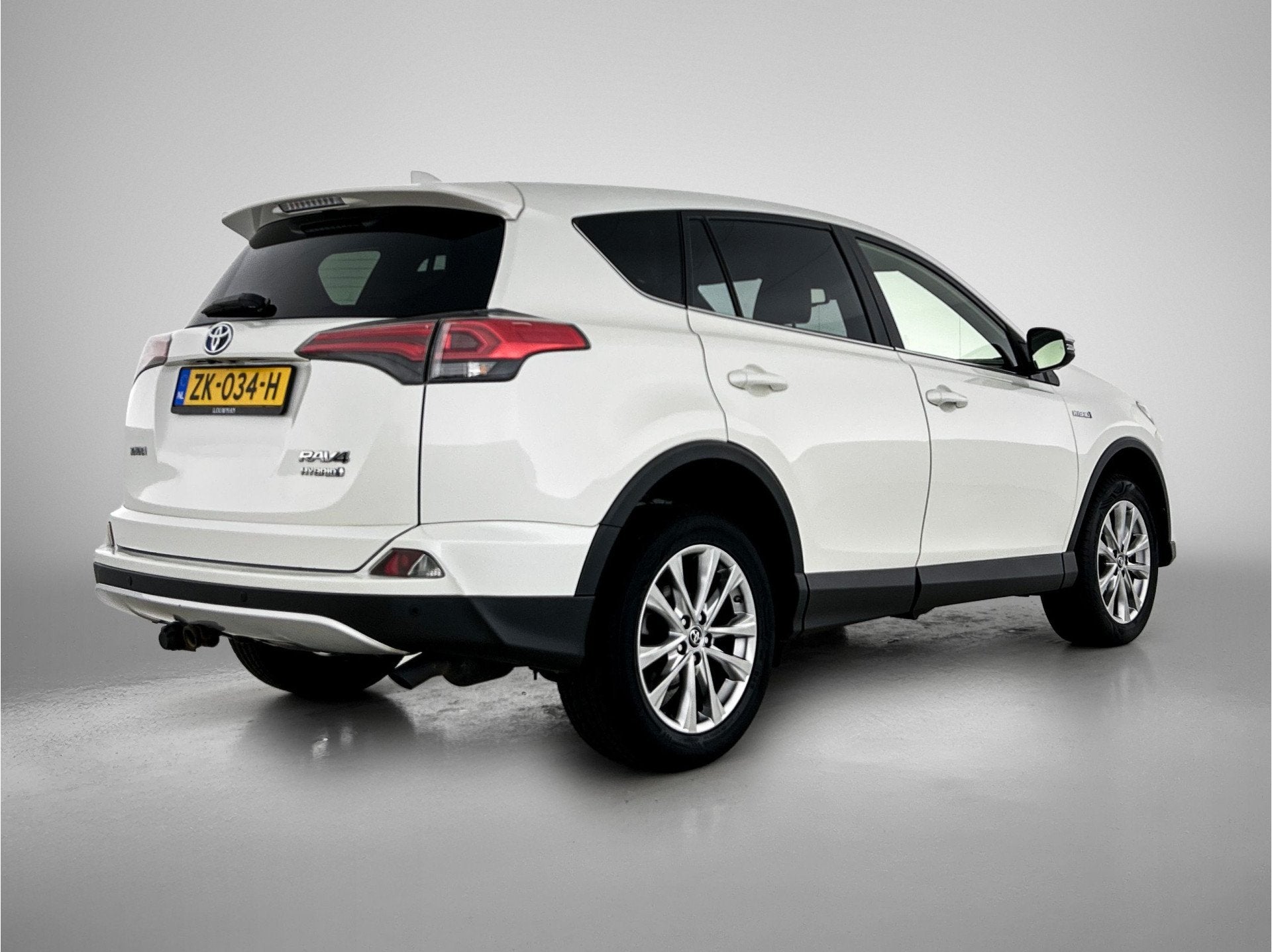 Toyota RAV4 2.5 Hybrid Executive Business | Trekhaak | Navig, 12 maanden, Gebruikt, Wit, Leder