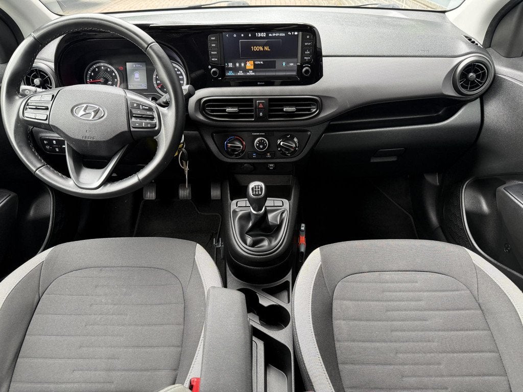 Hyundai i10 1.0 Comfort Smart / Eerste Eigenaar / Navigatie, Auto's, Hyundai, Voorwielaandrijving, Start-stop-systeem, Stof, Gebruikt