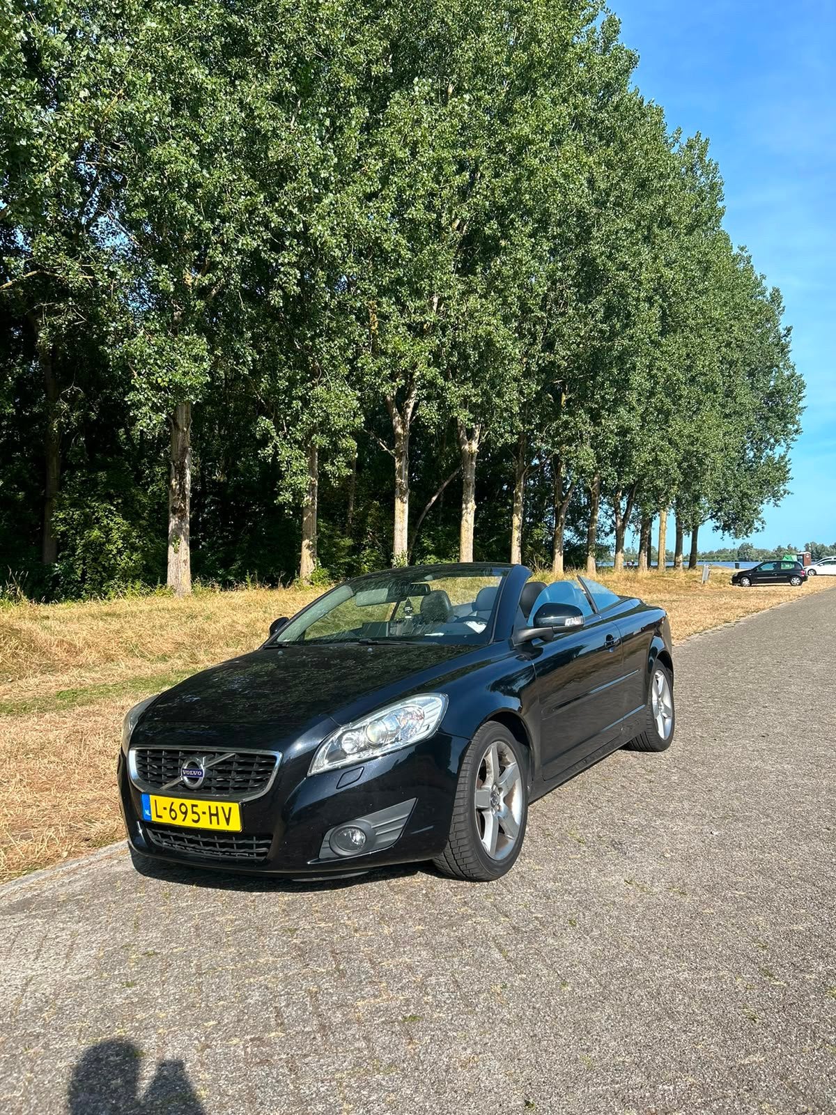 Volvo C70 2.0 D AUT 2010 Zwart, Auto's, Volvo, 4 cilinders, Cabriolet, 4 stoelen, Zwart