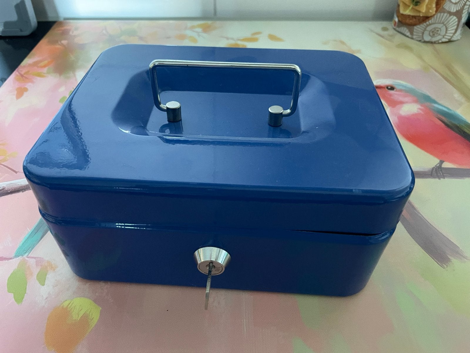 Blauw geldkistje, Ophalen, Gebruikt