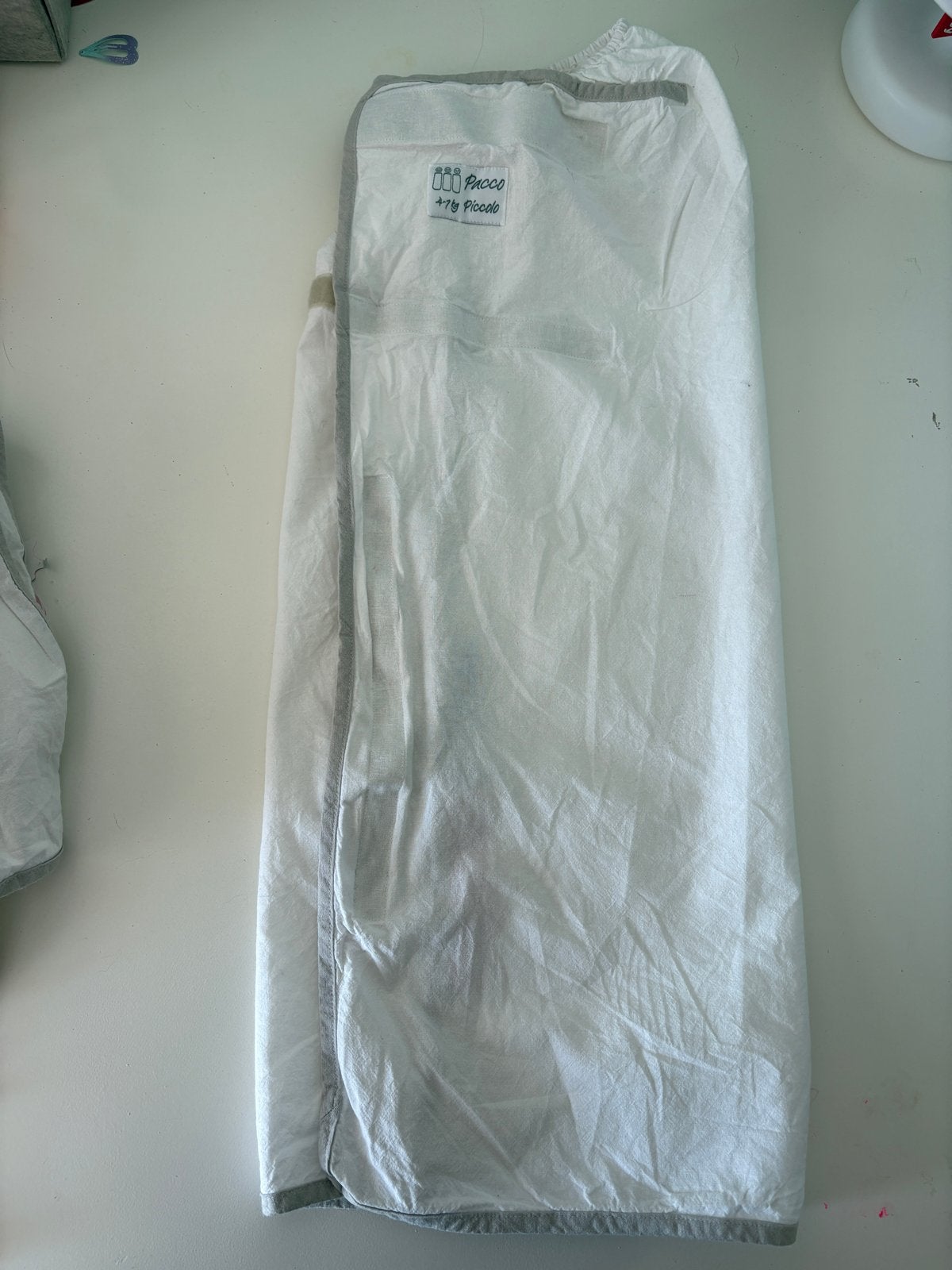 Pacco inbakerdoek Piccolo 4-7kg - Zo goed als nieuw, Wasbaar, Bakerzak of Bakerdoek, Puckababy, Ophalen of Verzenden