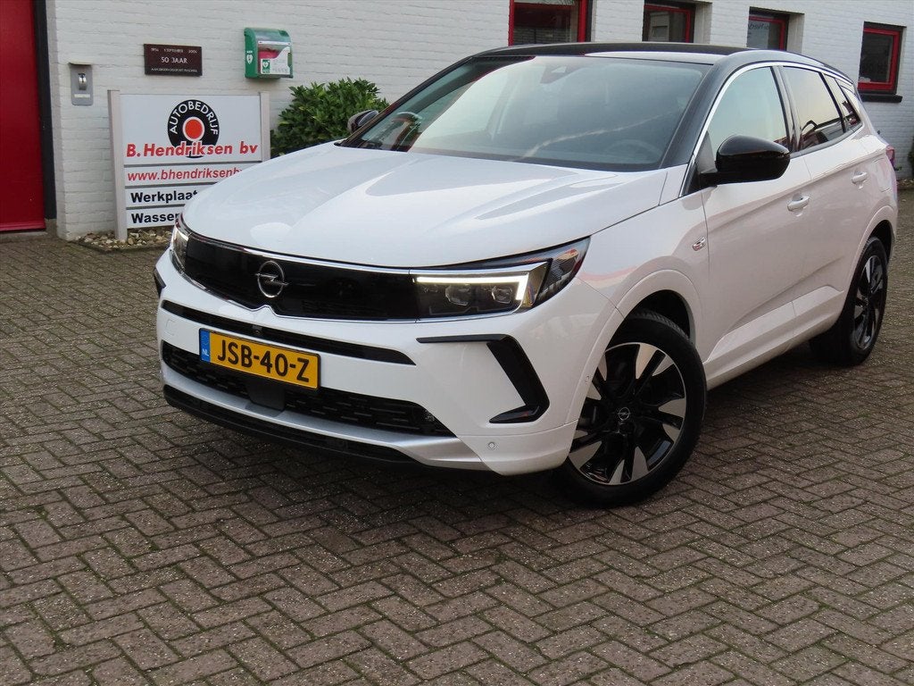 Opel Grandland 1.6 Turbo Hybrid 225pk Aut Ultimate/ All seas, Auto's, Opel, 4 cilinders, Wit, Bedrijf, Hybride Elektrisch/Benzine