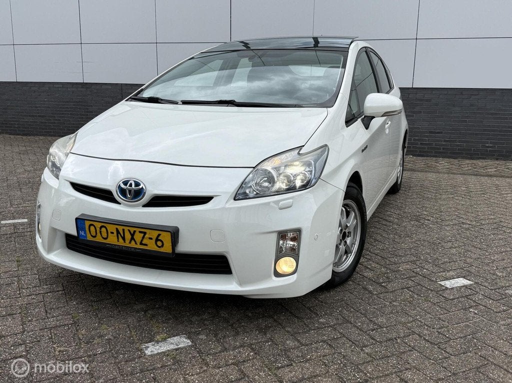 Toyota Prius 1.8 Dynamic Business*pano*stoelver*fulloptie, Auto's, Toyota, 136 pk, Gebruikt, 4 cilinders, Wit