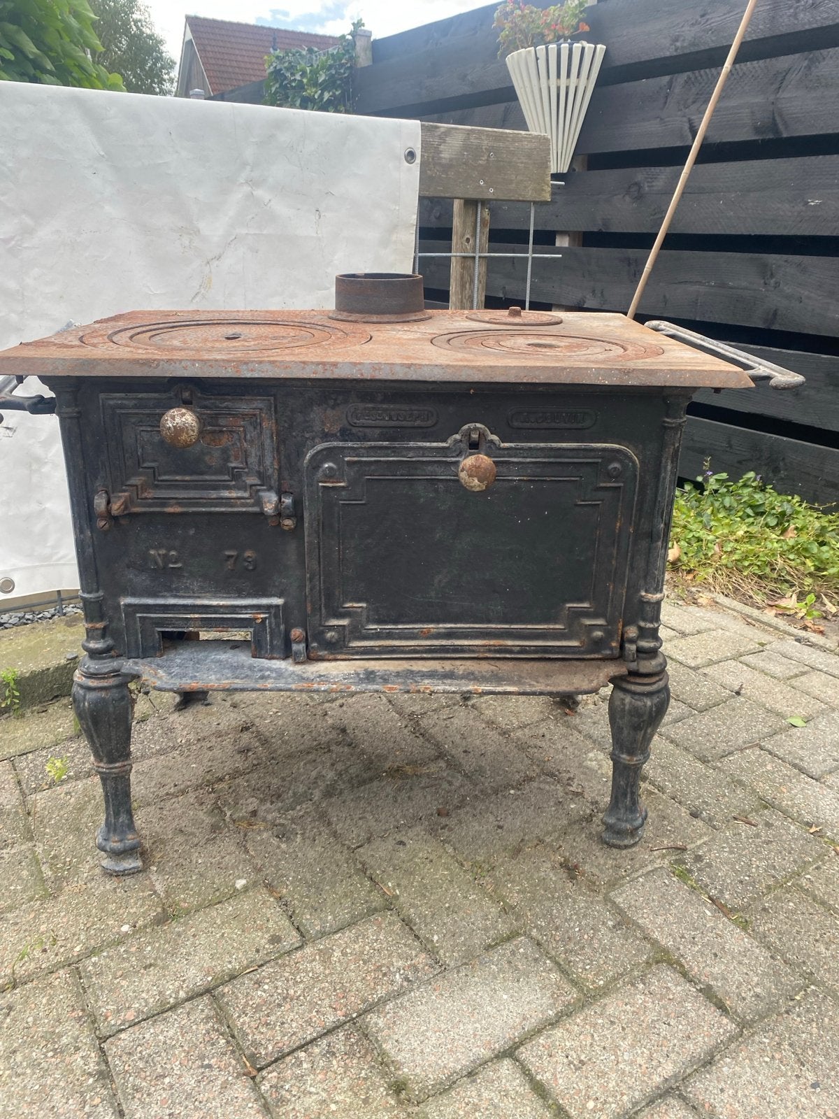 gietijzeren houtkachel, Ophalen