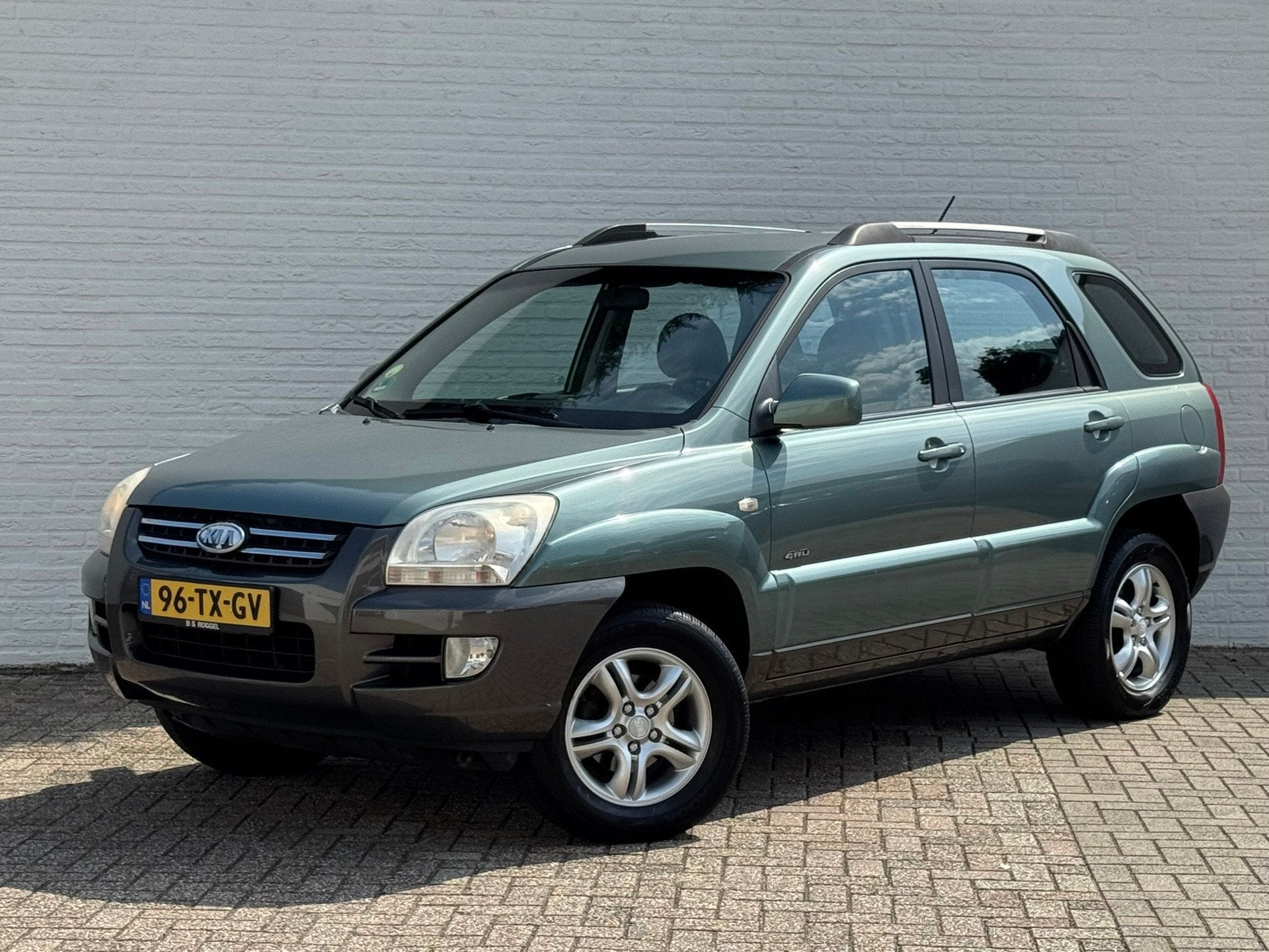 Kia Sportage 2.0 CVVT Comfort 4 WD Clima Cruise PDC Achter R, Auto's, Gebruikt, 4 cilinders, Leder en Stof, Origineel Nederlands
