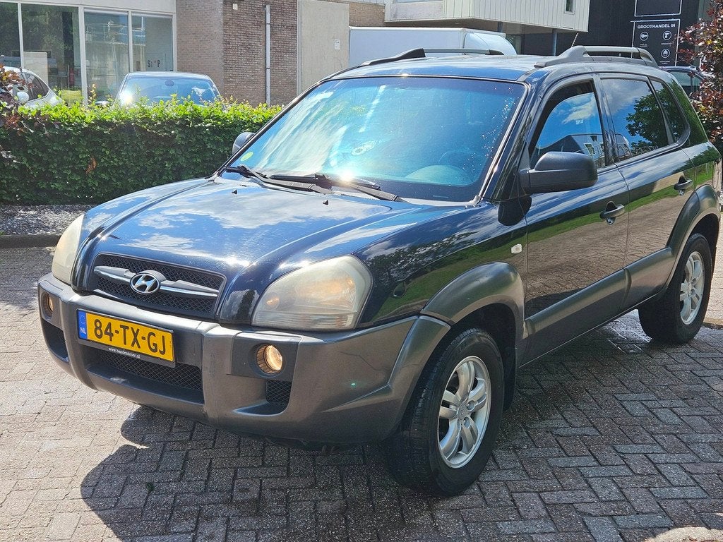 Hyundai Tucson 2.0i Active, Auto's, Gebruikt, 4 cilinders, Zwart, Origineel Nederlands