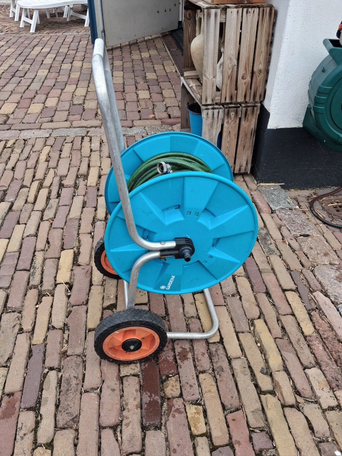 tuinslang haspel, Ophalen, Gebruikt, Tuinslang