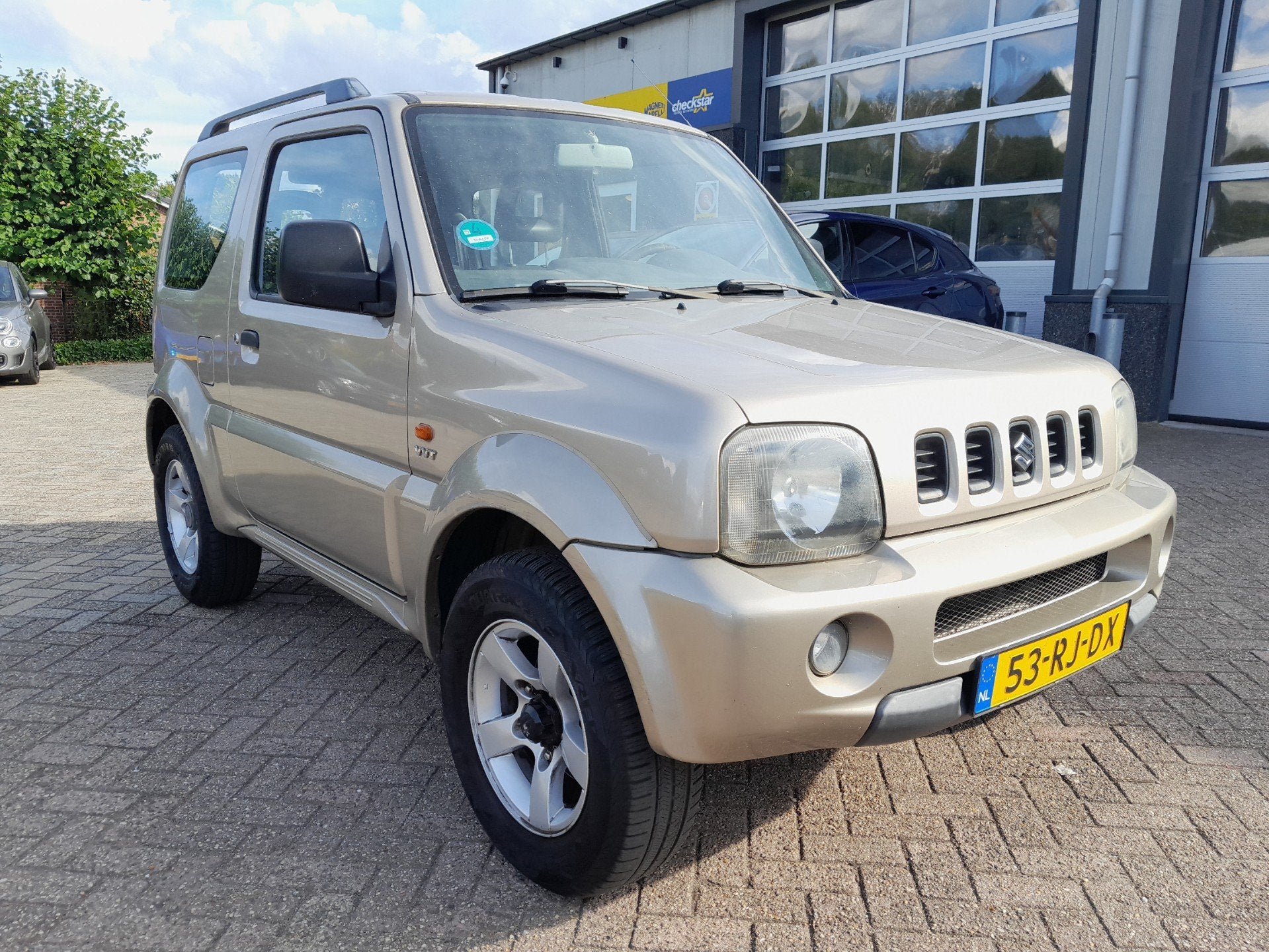 Suzuki Jimny 1.3 Exclusive - 4x4 - Airco, 40 €/maand, 4 stoelen, Beige, Bedrijf