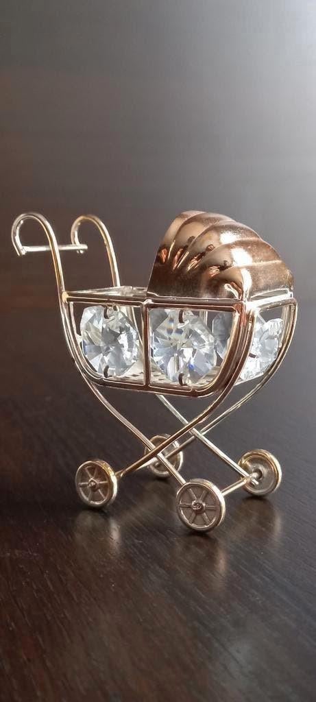 Een miniatuur Kinderwagen met Swarovski kristallen., Ophalen of Verzenden, Zo goed als nieuw, Dier