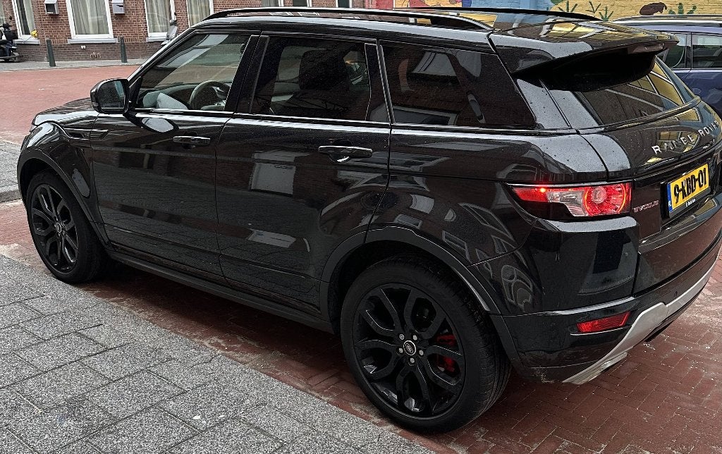 Land Rover Range Rover Evoque 2.2 TD4 4WD AUT 2013 Zwart, Auto's, Automaat, 15 km/l, 1800 kg, Zwart