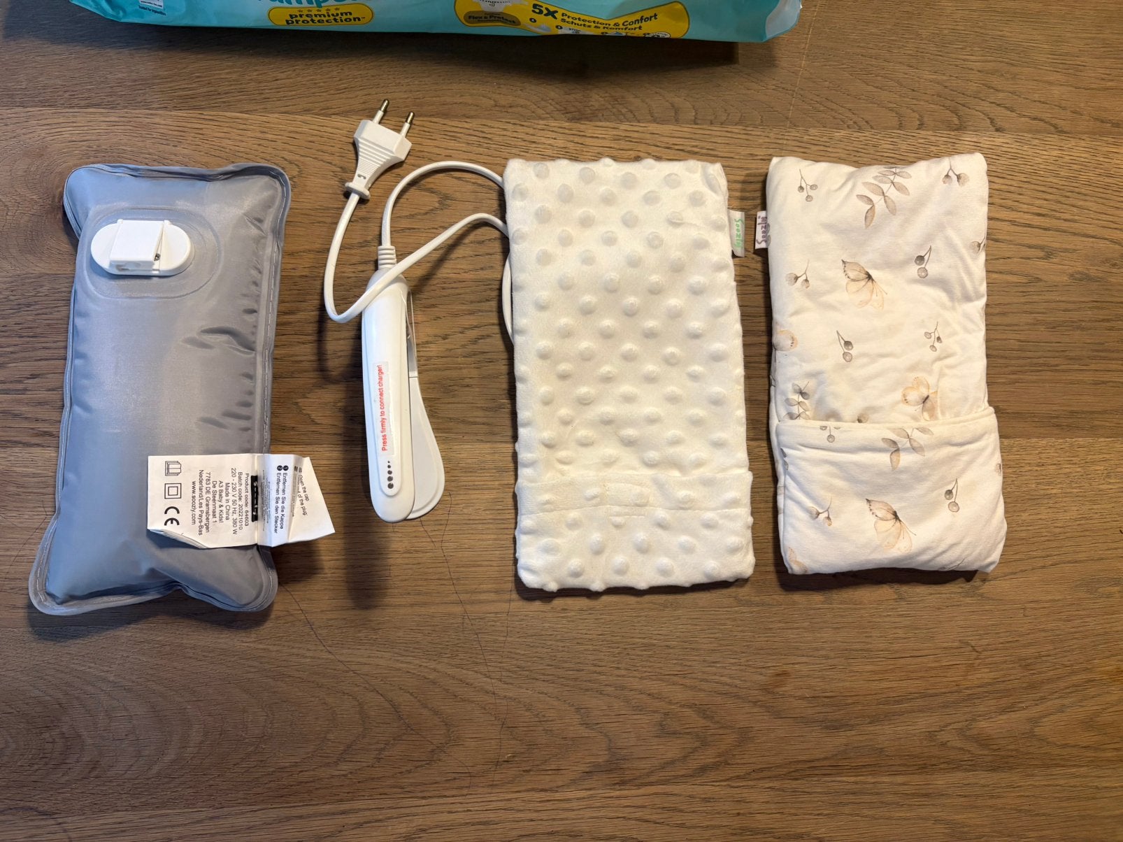 Elektronisch verwarmbare kruik Soozly met extra hoesjes, Kinderen en Baby's, Ophalen of Verzenden, Zo goed als nieuw