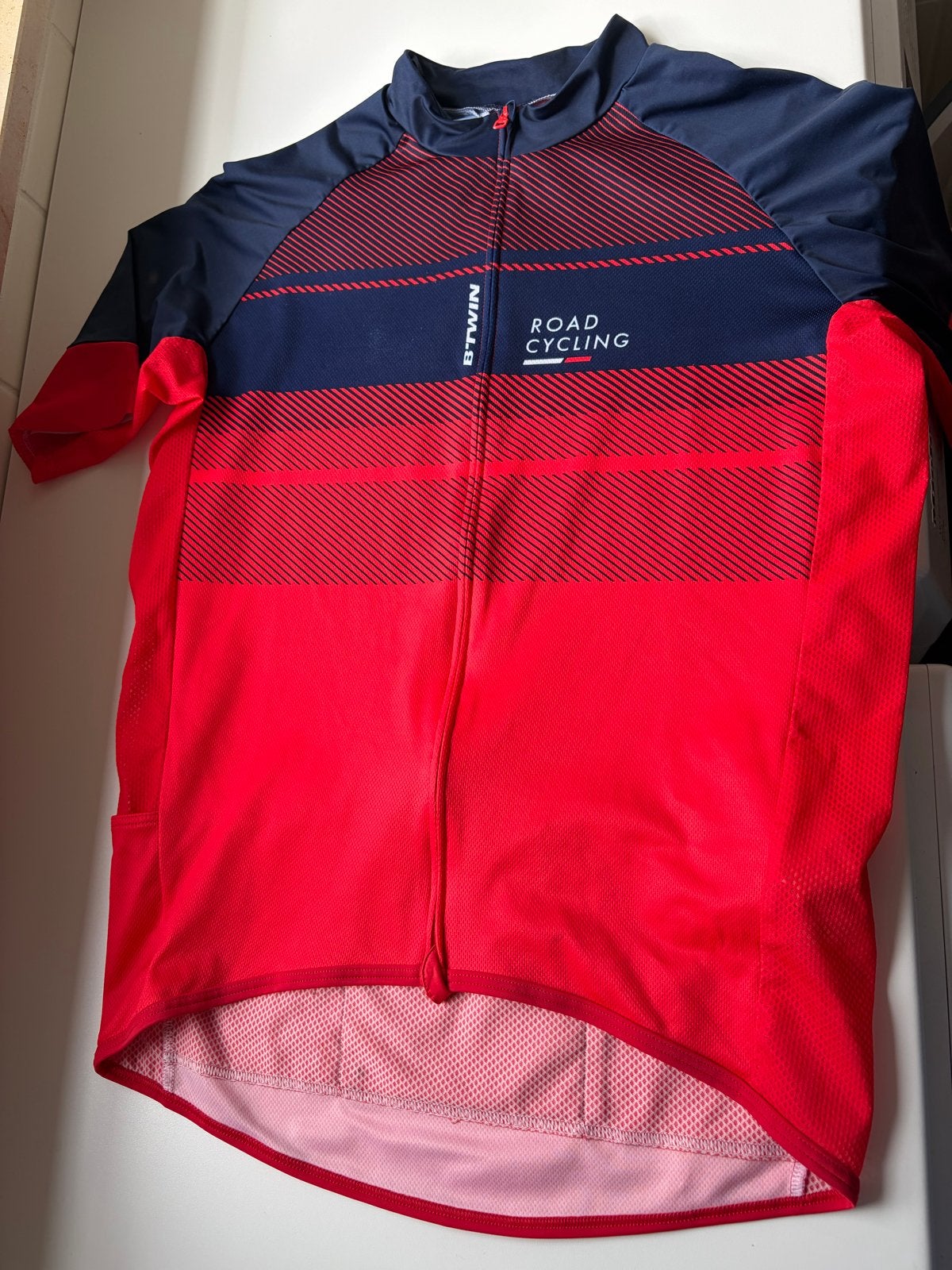 Btwin Wielershirt Maat L Blauw/Rood - Zo goed als nieuw, Fietsen en Brommers, Fietsaccessoires | Fietskleding, Heren, Ophalen of Verzenden