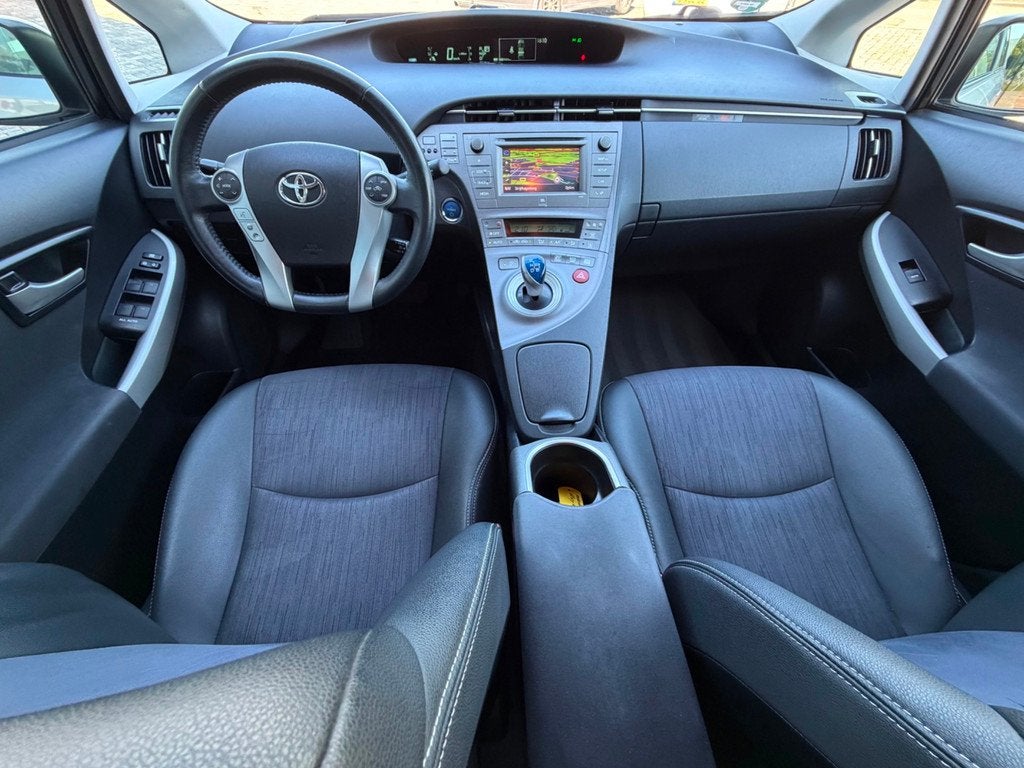 Toyota Prius 1.8 Hybrid 136pk automaat Dynamic Business deal, Auto's, Toyota, Euro 5, Gebruikt, Zwart, 4 cilinders