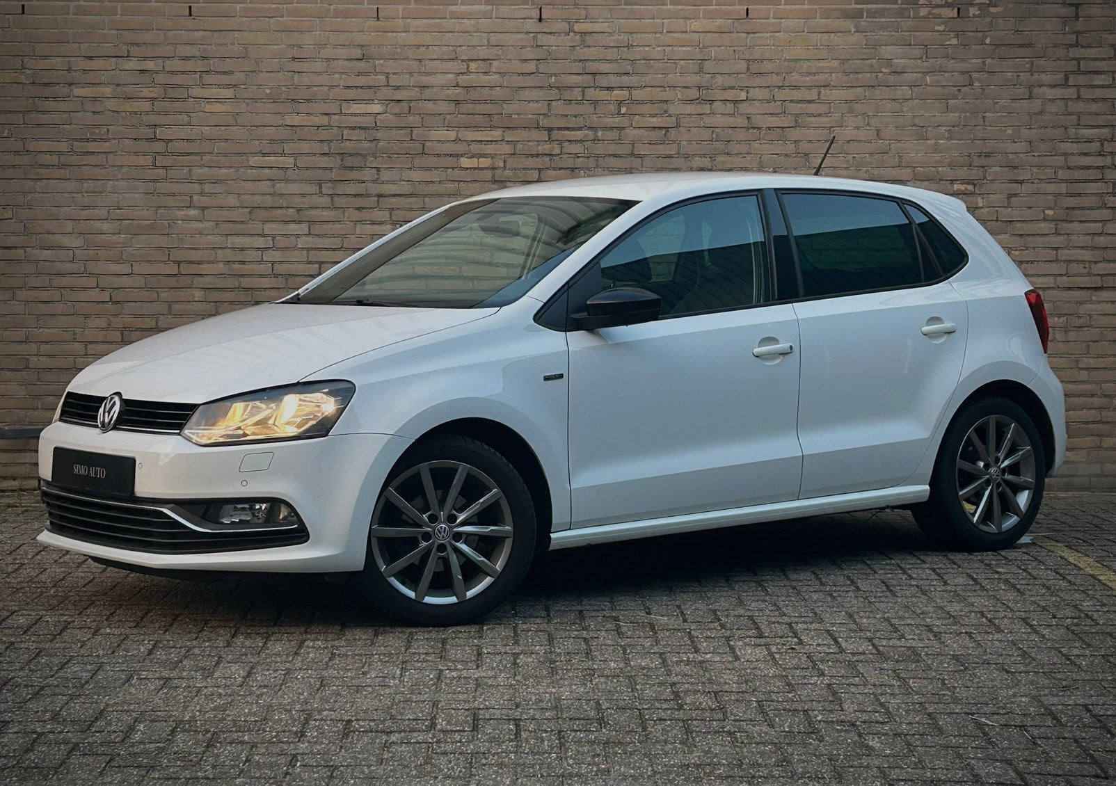Volkswagen Polo 1.2 TSI FRESH SPORT STOELVERWARMING CRUISE, Stof, 4 cilinders, Wit, Bedrijf