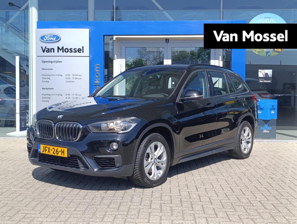BMW X1 sDrive18i | Stoelverwarming | Cruise Control | Naviga, Auto's, 12 maanden, Gebruikt, Zwart, Bedrijf