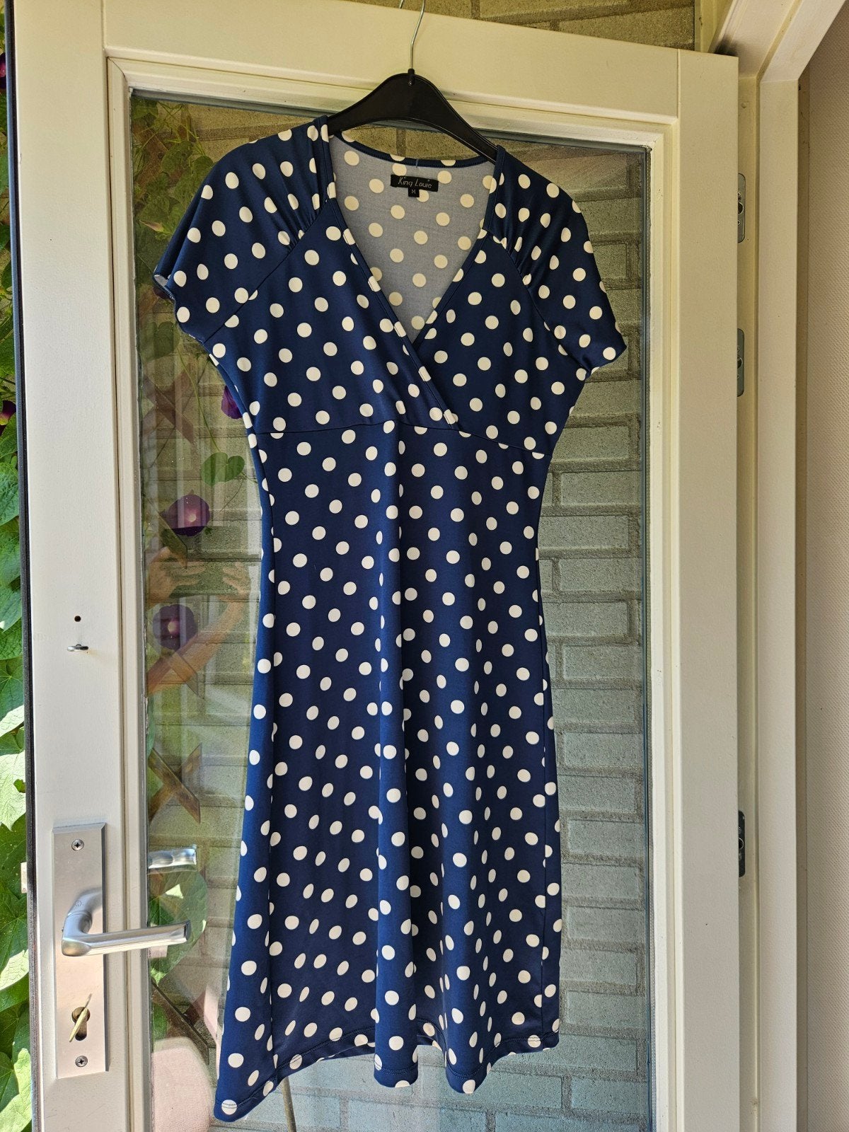 Heel mooi jurkje van King Louie M blauw polkadot, Maat 38/40 (M), Blauw, Ophalen of Verzenden, Zo goed als nieuw