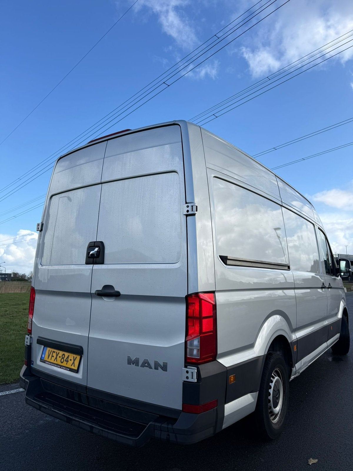 MAN TGE GB 2.0 TDI 177pk SW H2 3.180 FWD 2020 Grijs, Auto's, Bestelauto's, Stof, Zwart, 4 cilinders, MAN