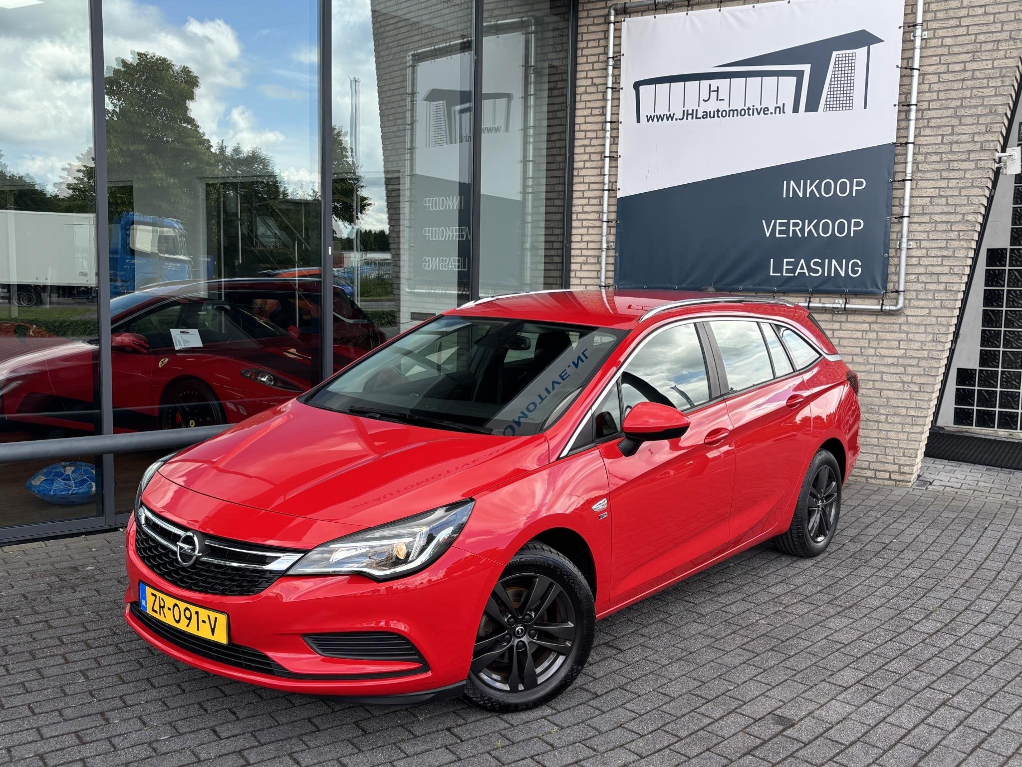 Opel Astra Sports Tourer 1.0 Turbo 120 Jaar Edition*A/C*NAVI, Auto's, Voorwielaandrijving, Stof, Gebruikt, 1178 kg