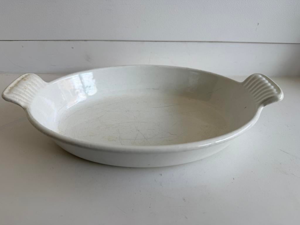 Le Creuset vintage witte ovenschaal 24cm ovaal, Ophalen of Verzenden, Gebruikt, Gietijzer, Overige typen