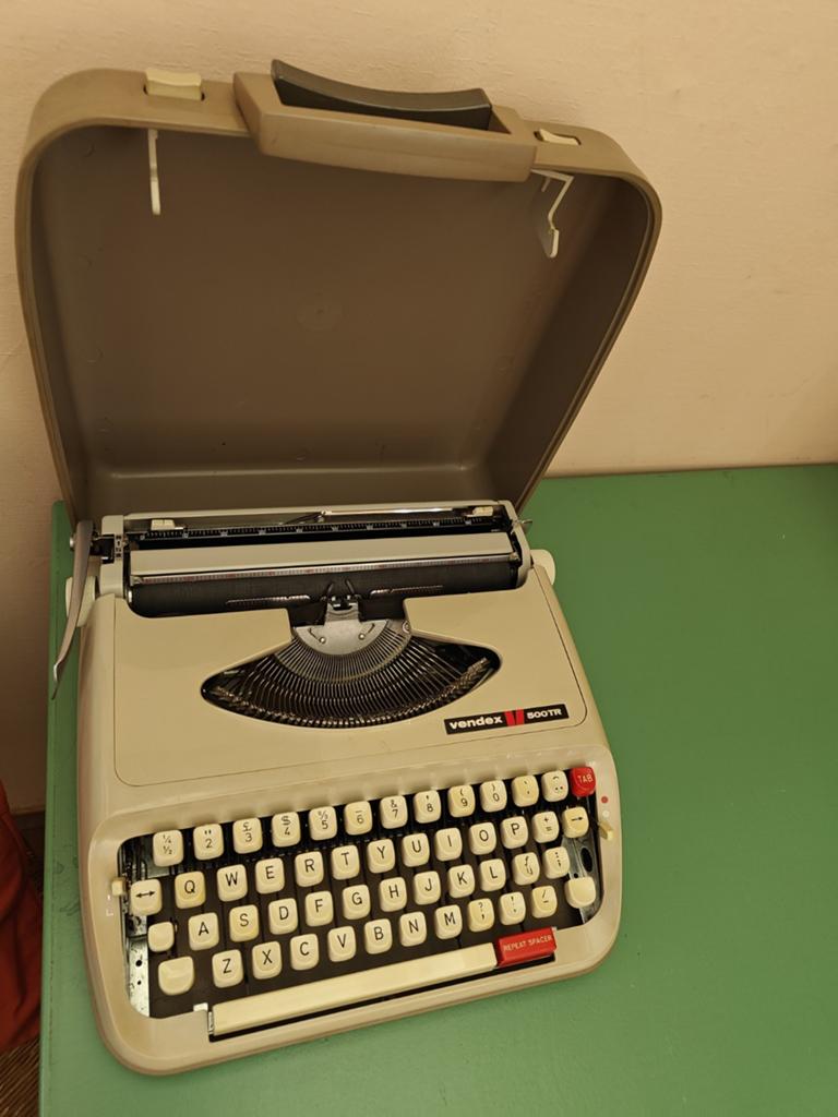 Vendex typemachine in koffer, Ophalen