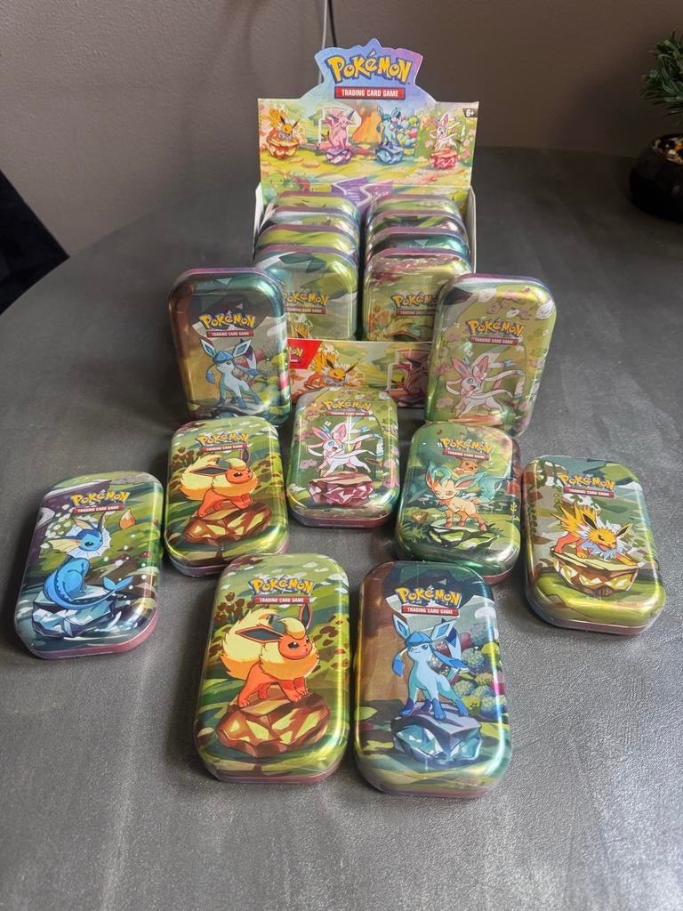 Pokémon prismatic evolution Mini Tins 17 stuks., Ophalen of Verzenden, Nieuw, Overige typen