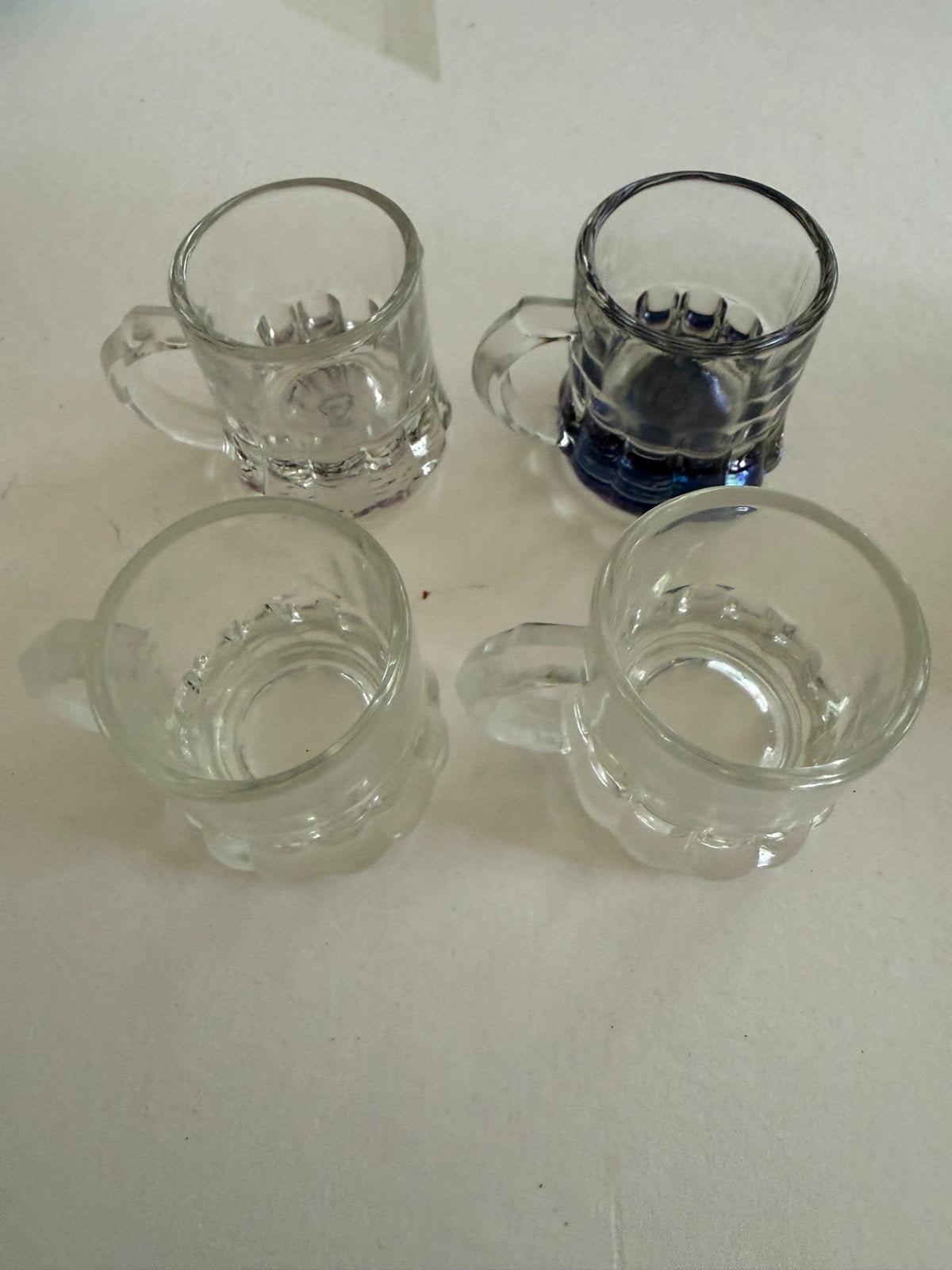 Set van 4 shotglaasjes - 3 transparant, 1 blauw, Ophalen of Verzenden