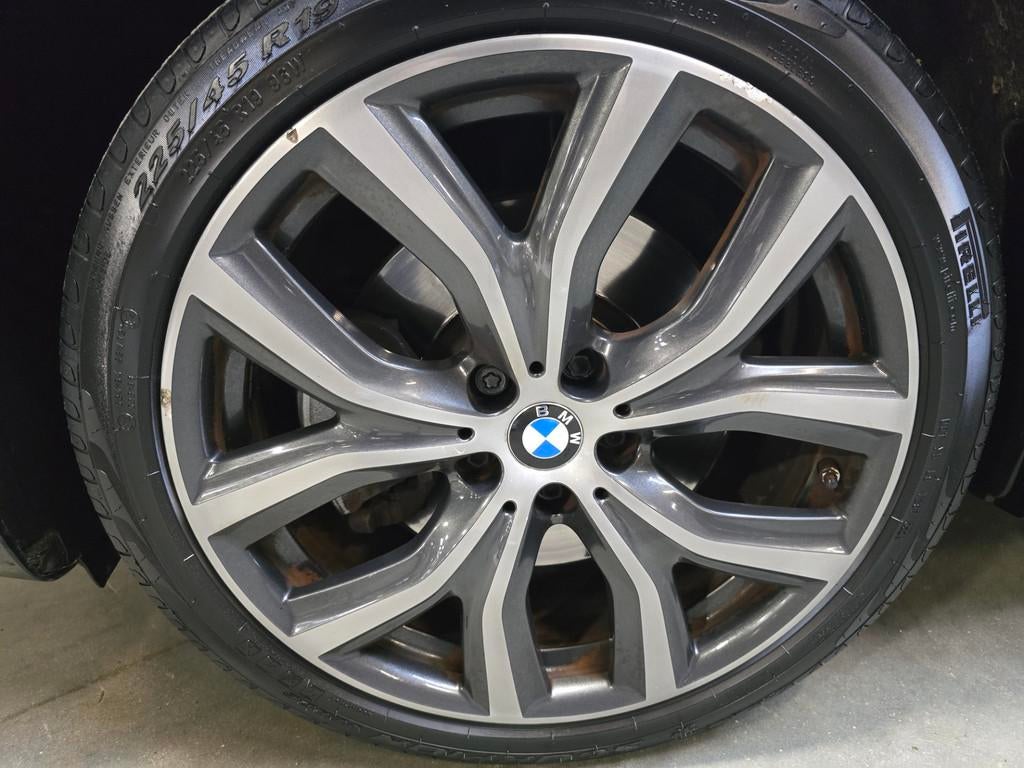 BMW X1 SDrive20i Centennial Executive Xenon Navi Airco Cruis, 1998 cc, Stof, Zwart, Origineel Nederlands