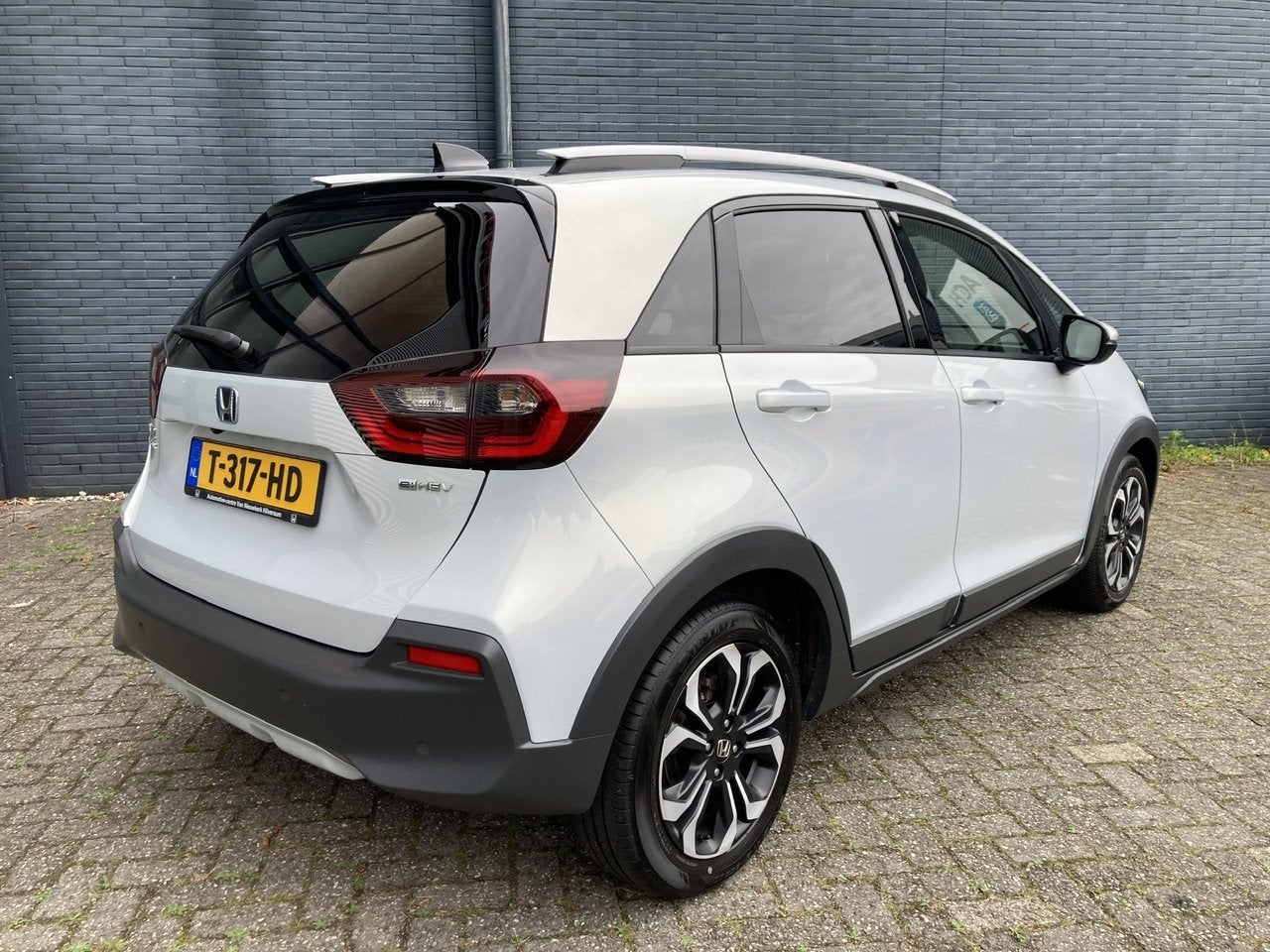 Honda Jazz 1.5 i-MMD 109pk Hybrid Automaat Crosstar | Naviga, Stof, 4 cilinders, Wit, Bedrijf