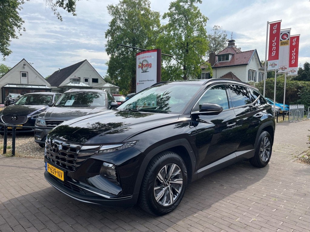 Hyundai TUCSON 1.6 T-GDI MHEV / NAVI / CAMERA / STOELVERW. /, Auto's, Voorwielaandrijving, 15 km/l, Gebruikt, 4 cilinders