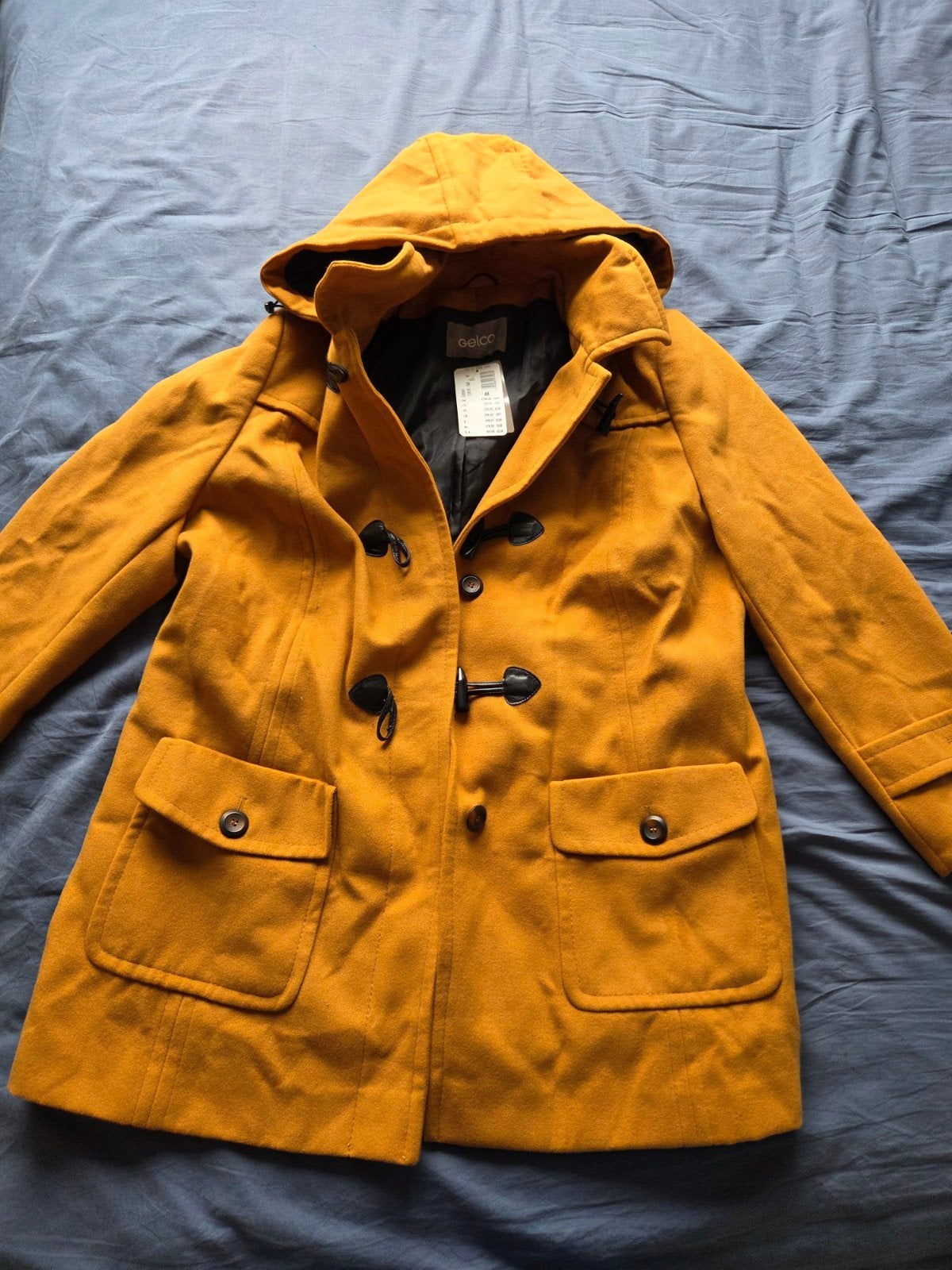 Gelco duffelcoat mosterdgeel maat 48, Gelco, Ophalen of Verzenden, Nieuw, Maat 46/48 (XL) of groter