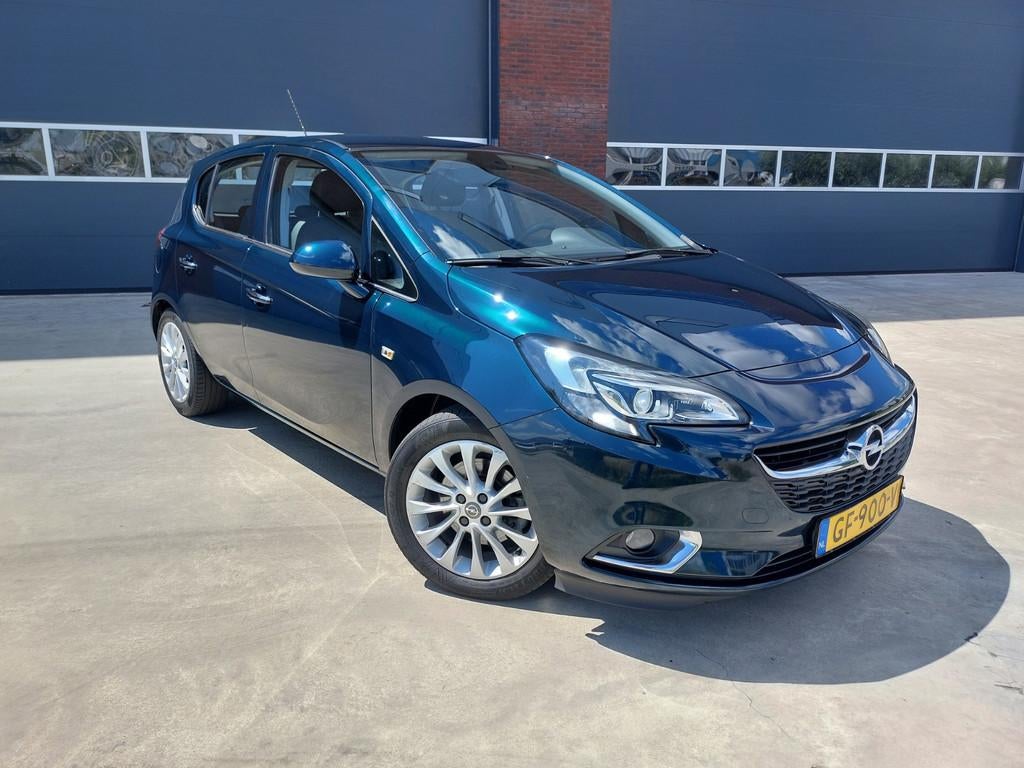 Opel Corsa 1.0 Turbo Cosmo Airco/ECC/LMV, Voorwielaandrijving, Gebruikt, Leder en Stof, Handgeschakeld