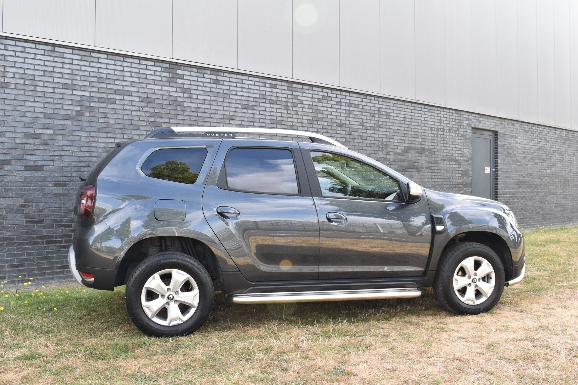 Dacia Duster 1.2 TCe Comfort Airco sidestep (bj 2018), Auto's, Dacia, Voorwielaandrijving, Stof, Gebruikt, Euro 6