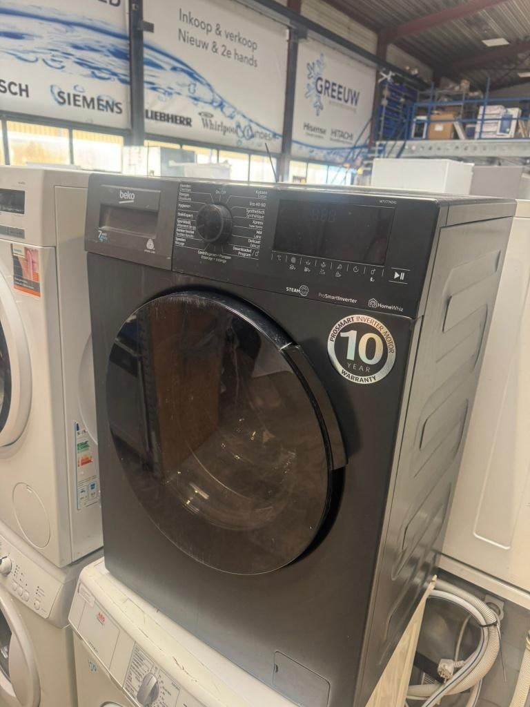 beko wtv7742a1 Zwarte wasmachine jong!, Witgoed en Apparatuur, Wasmachines, Ophalen of Verzenden, Zo goed als nieuw, Voorlader