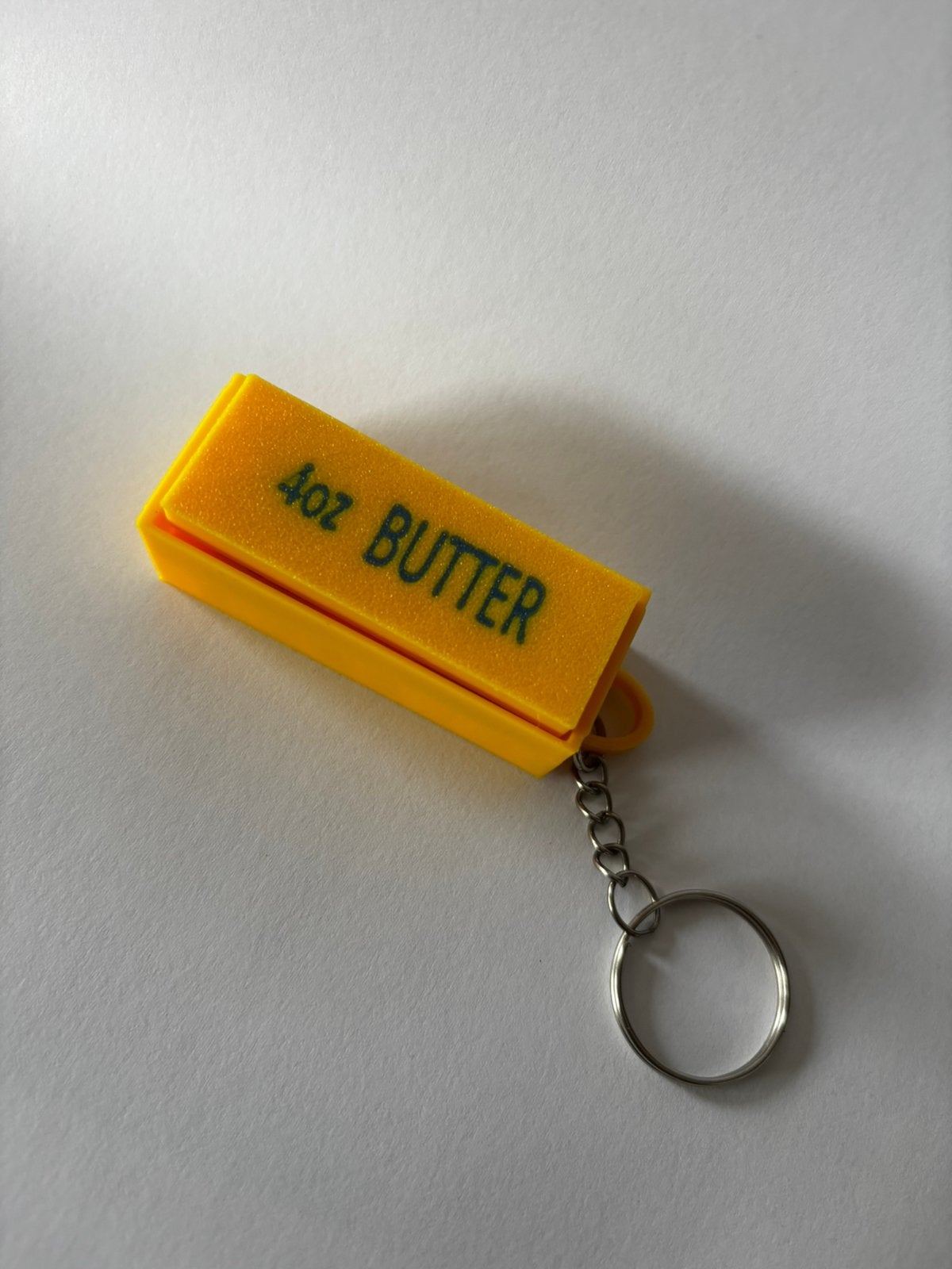 Fidget clicker sleutelhanger squishy butter, Verzamelen, Sleutelhangers, Ophalen, Zo goed als nieuw