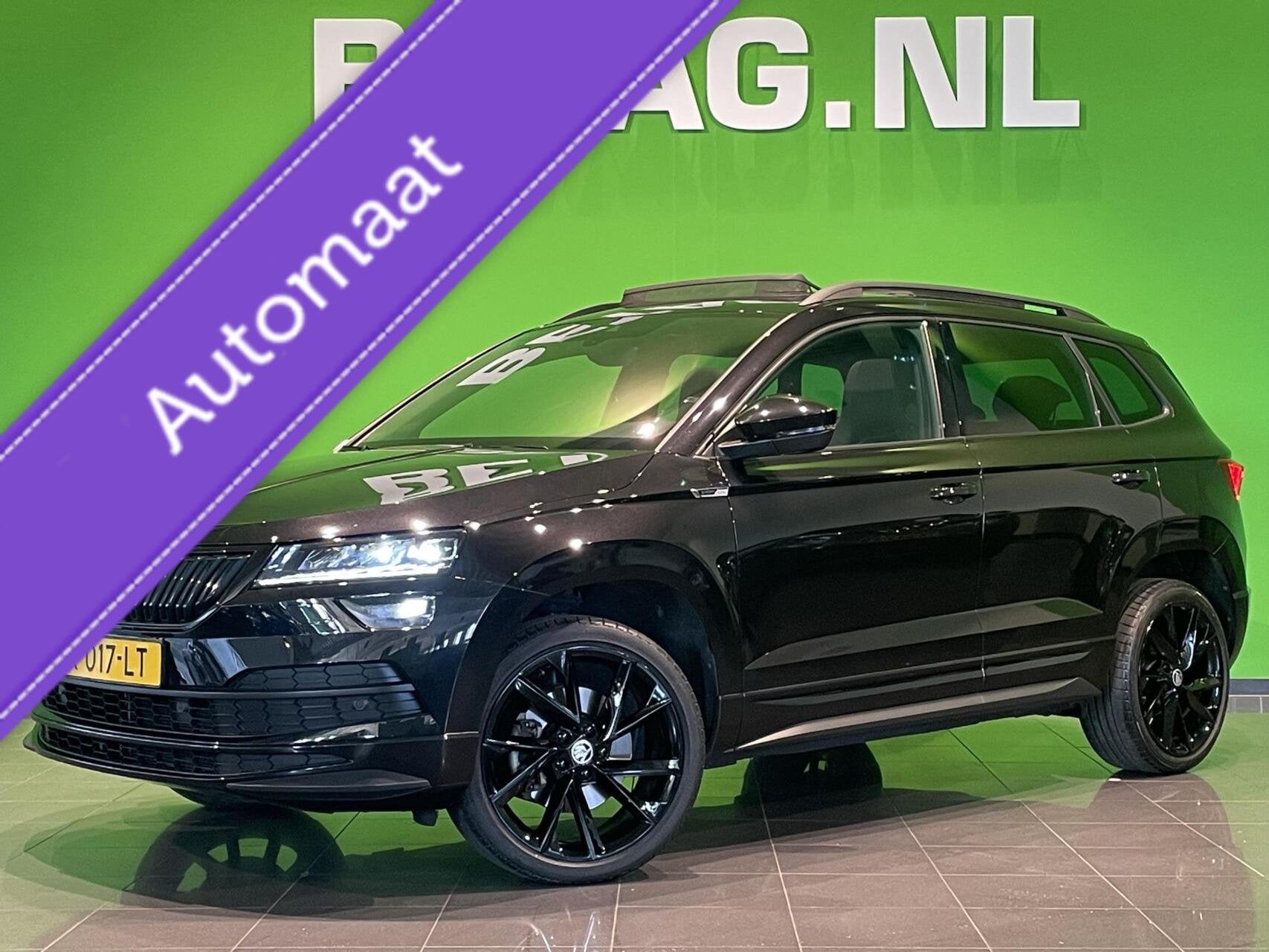 Skoda Karoq 1.5 TSI ACT Sportline Business | Panorama dak |, Auto's, 4 cilinders, 150 pk, Automatische klimaatregeling, Zwart