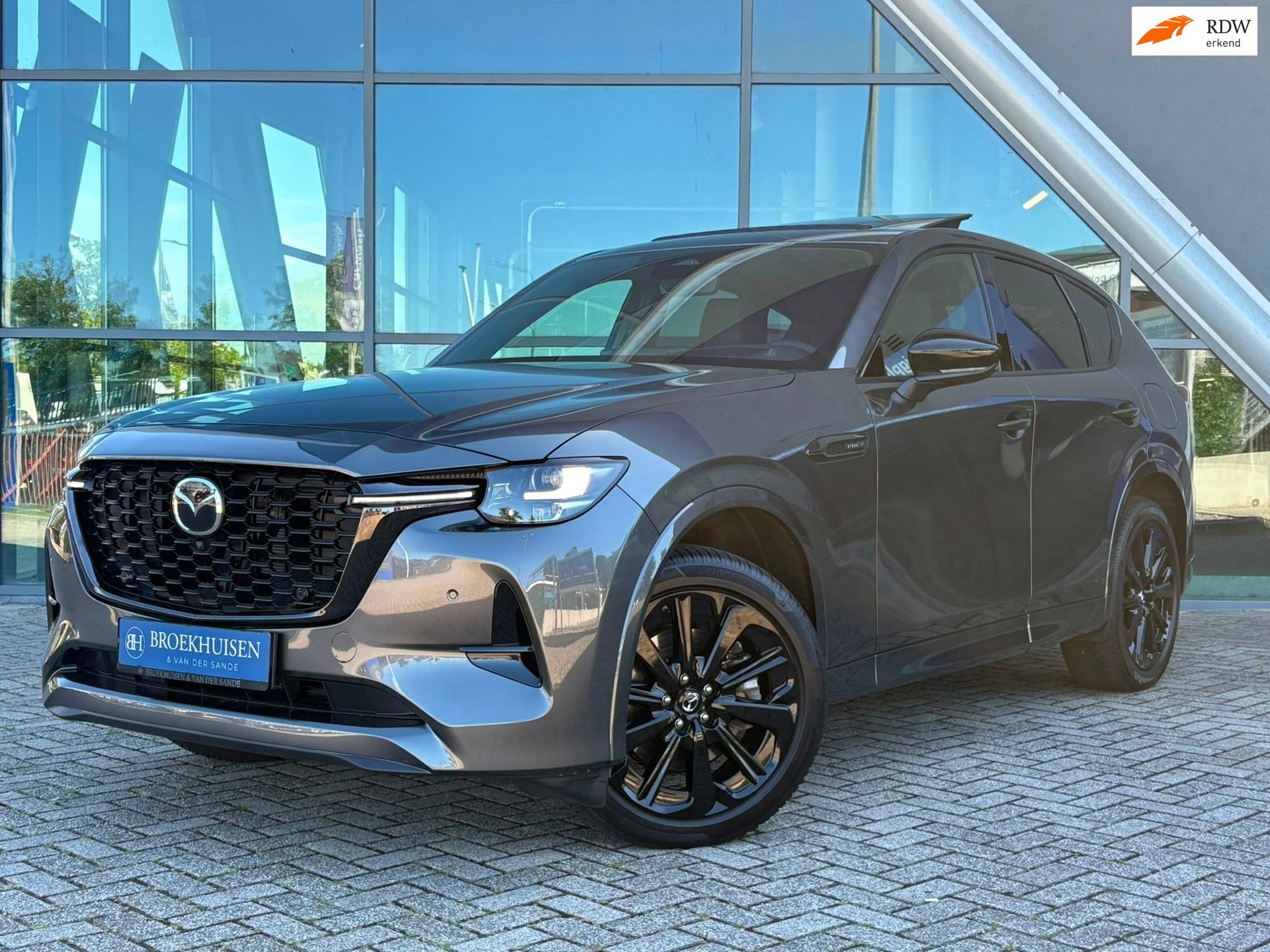 Mazda CX-60 2.5 e-SkyActiv PHEV Homura Plus 327pk Panoramada, Auto's, Mazda, Automaat, Dealer onderhouden, Gebruikt, Zwart