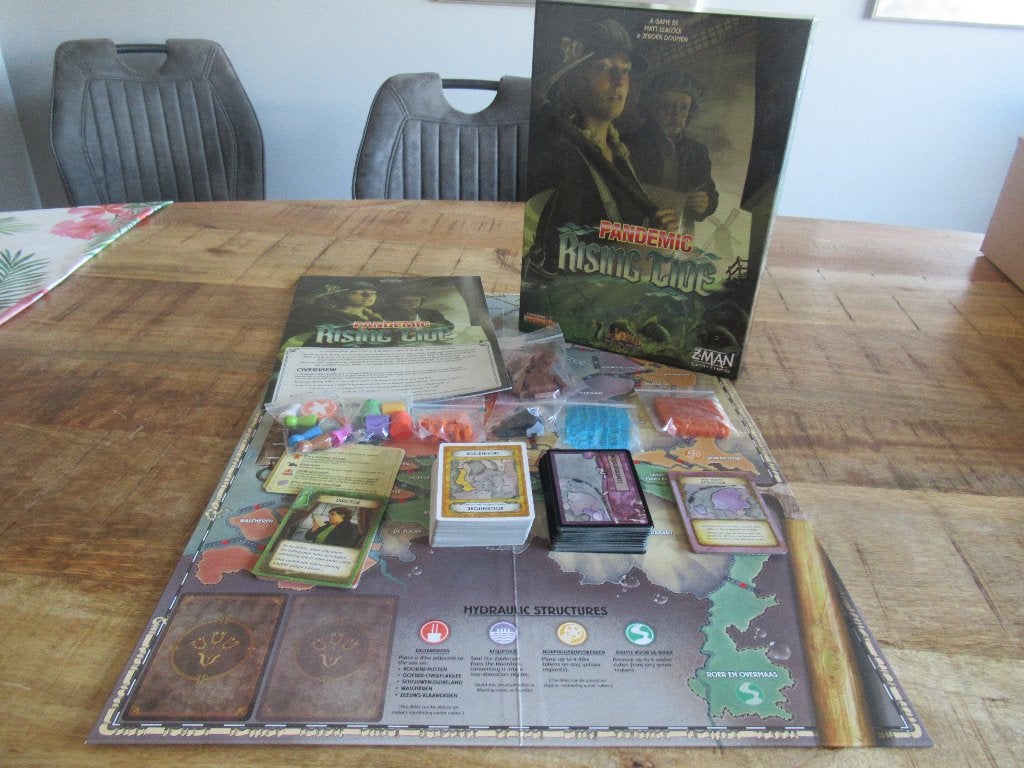 NIEUW en Compleet spel Pandemic Rising Tide, Hobby en Vrije tijd, Ophalen of Verzenden, Nieuw