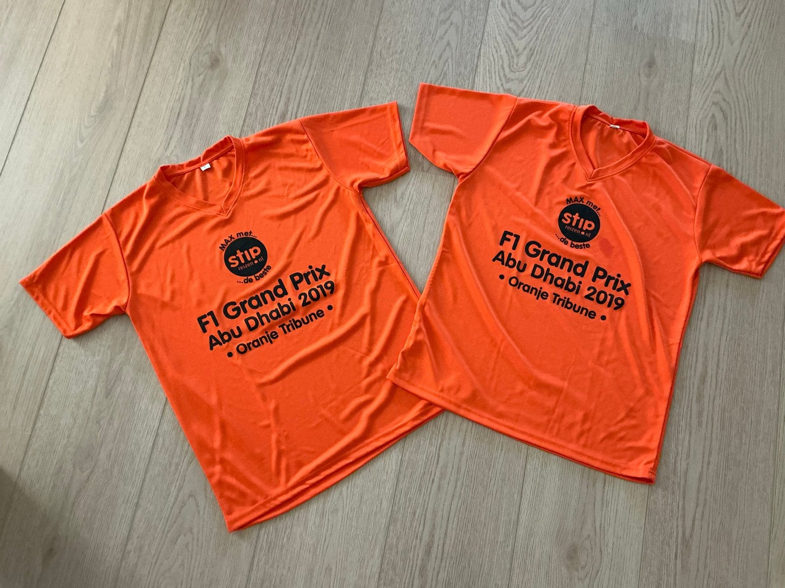 F1 Grand Prix Abu Dhabi 2019 Oranje Tribune T-shirts, 2 st., Ophalen of Verzenden, Zo goed als nieuw, Maat 52/54 (L), Oranje