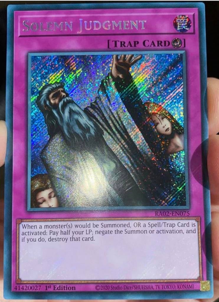 Yu-Gi-Oh! Solemn Judgment RA02 1st Edition !, Ophalen of Verzenden, Zo goed als nieuw, Losse kaart, Foil
