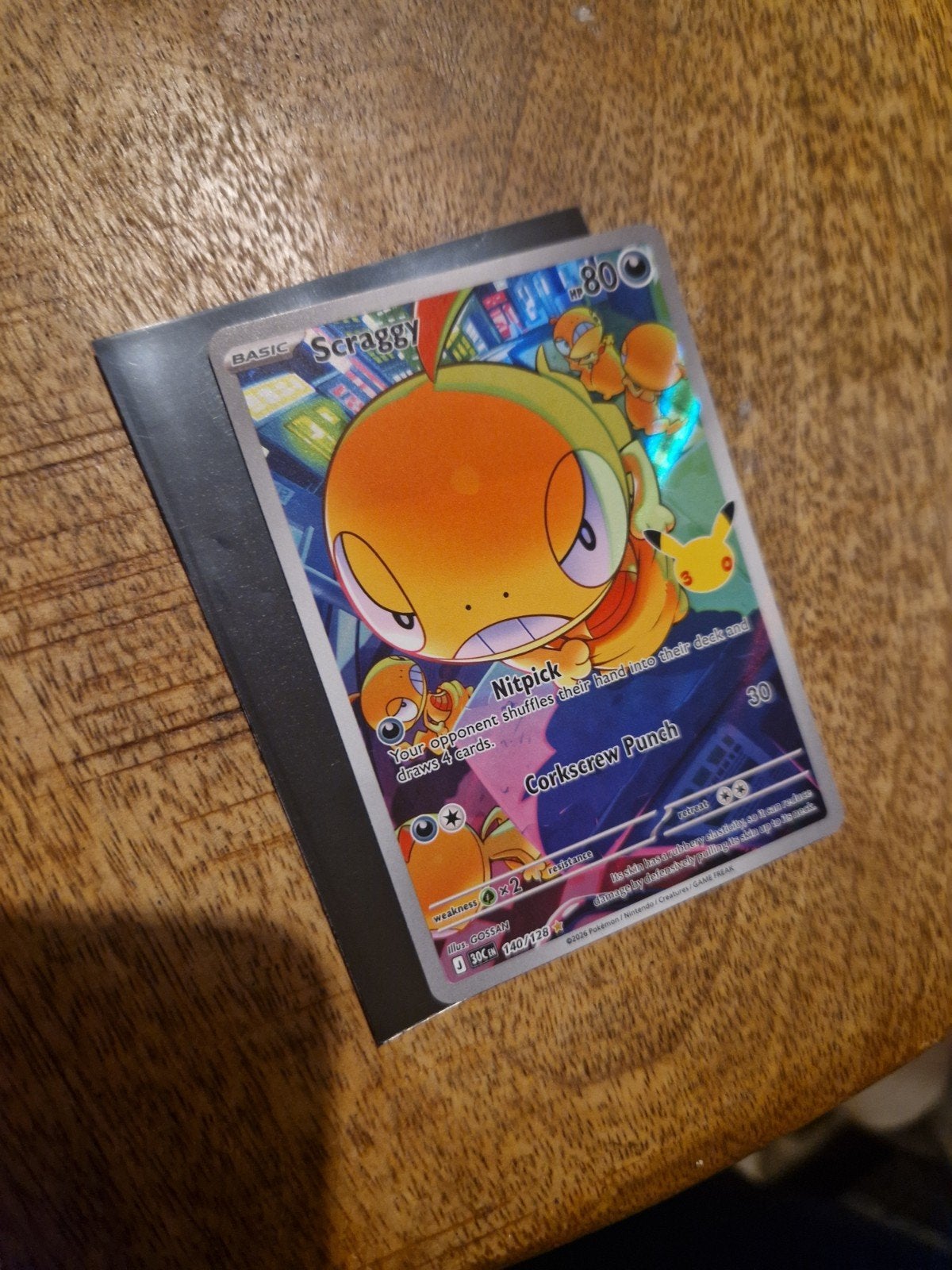 Pokémon Scraggy Celebrations 130/128 Holo Kaart, Hobby en Vrije tijd, Ophalen, Zo goed als nieuw, Losse kaart, Foil