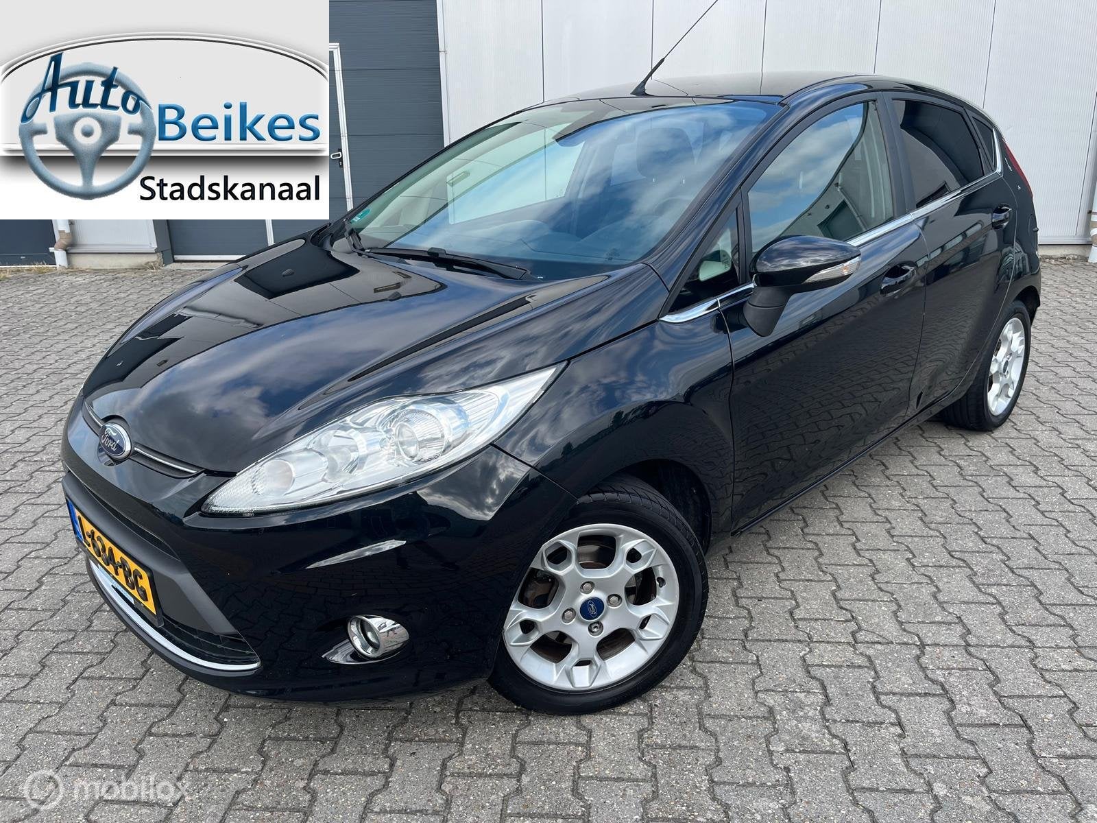 Ford Fiesta Titanium 5 deurs 1.25, Auto's, Voorwielaandrijving, Euro 5, Stof, Met garantie (alle)
