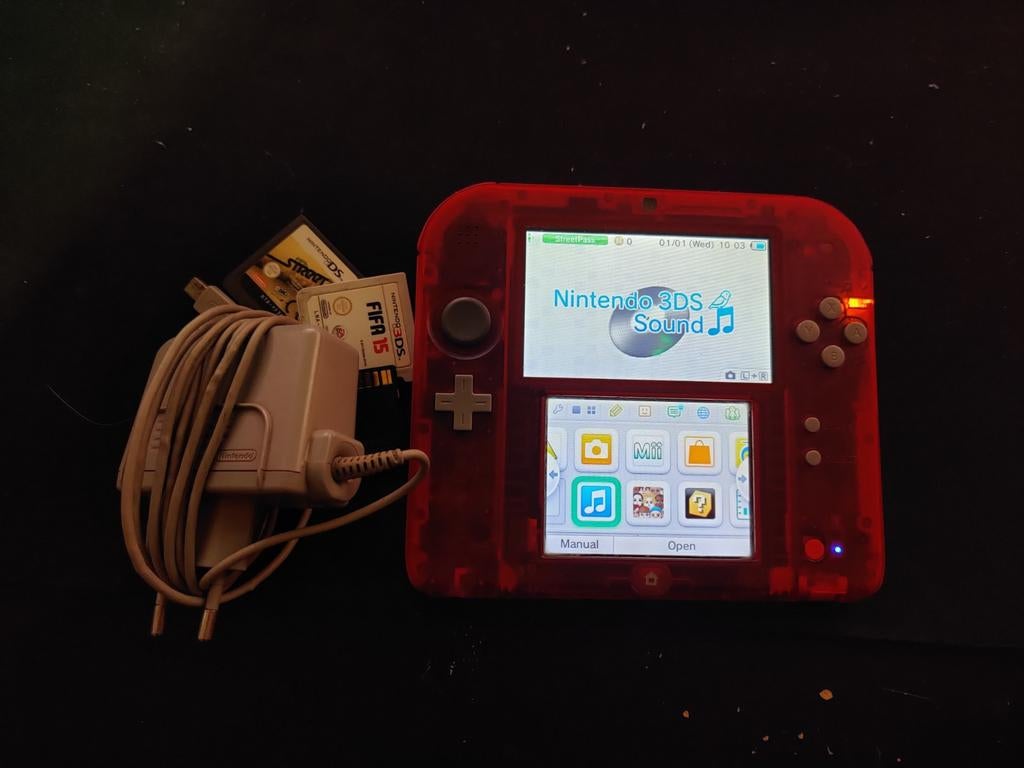 Nintendo 2DS met games en oplader, Gebruikt, 1 speler, Ophalen of Verzenden, Vanaf 3 jaar